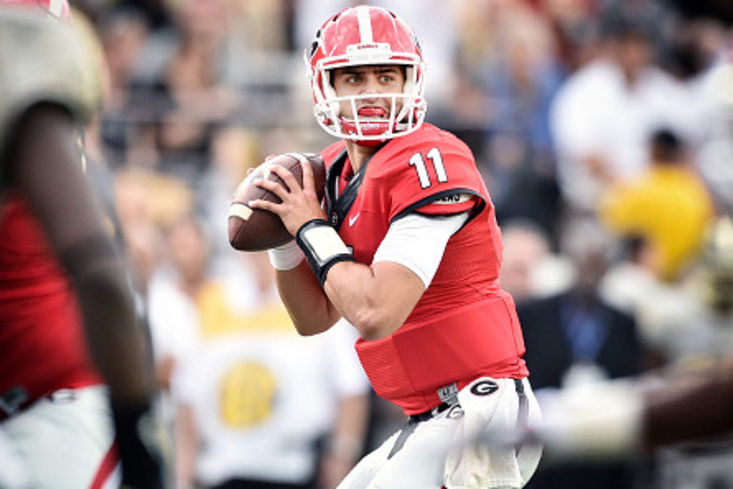 NASHVILLE, TN - SEPTEMBER 12:  Quarterback Greyson Lambert #11 of the Georgia Bulldogs looks for a receiver against the Vanderbilt Commodores at Vanderbilt Stadium on September 12, 2015 in Nashville, Tennessee.  (Photo by Ronald C. Modra/Sports Imagery/Ge