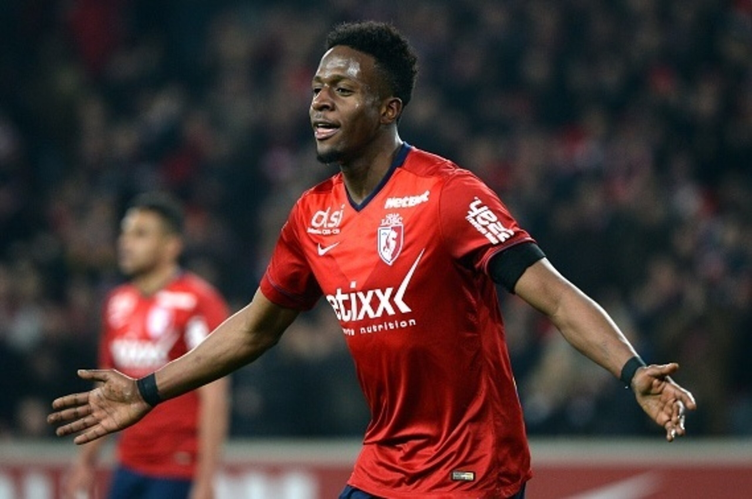 Lille's Belgian forward Divock Origi celebrates after scoring a goal during the French L1 football match between Lille (LOSC) and Rennes (SRFC) on March 15, 2015 at the Pierre Mauroy stadium in Villeneuve-d'Ascq, northern France. AFP PHOTO / DENIS CHARLET