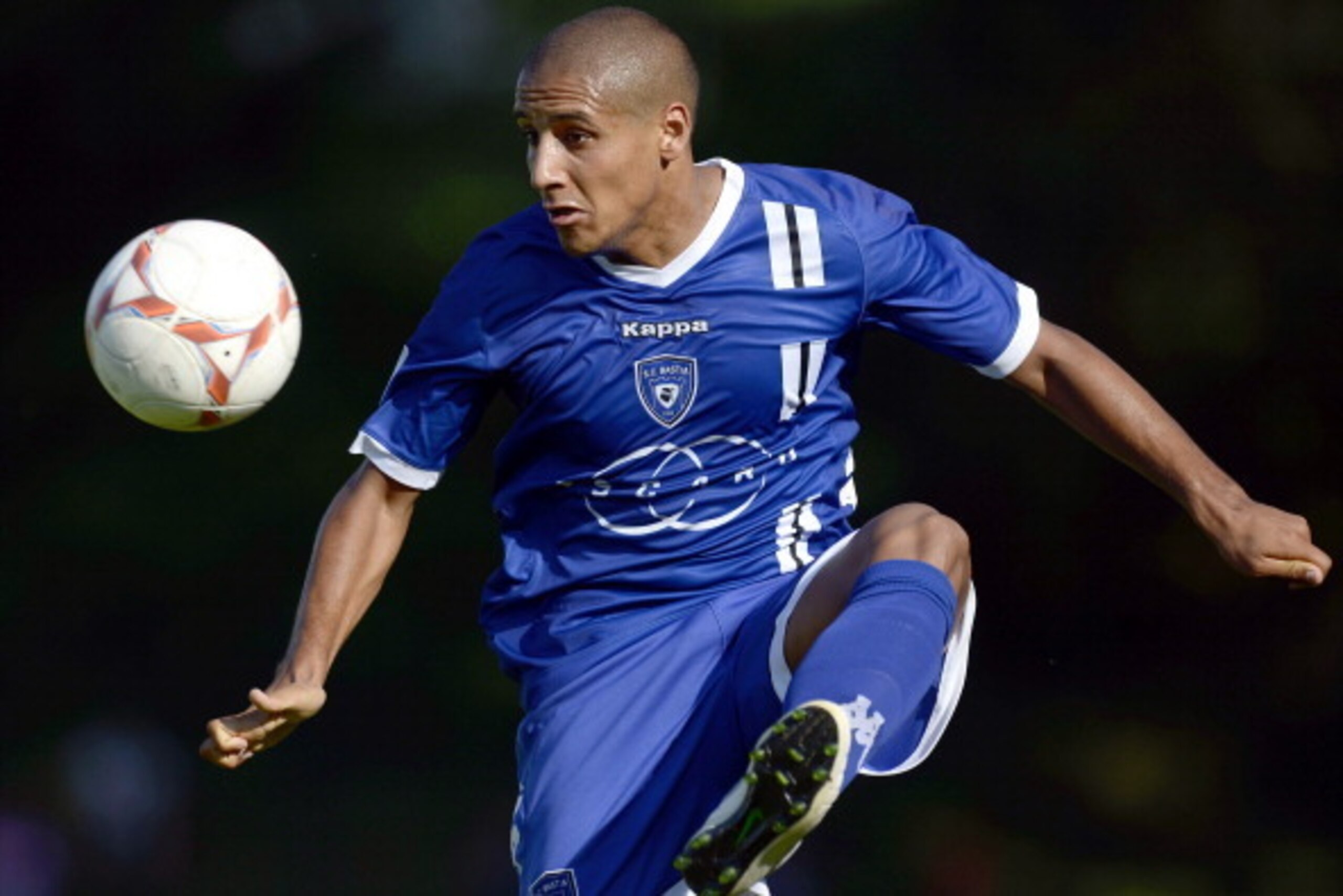 Bastia's French midfielder Whabi Khazri is pictured with the ball during the friendly football match Evian Thonon Gaillard vs Bastia on July 24, 2012, at the Salvator Mazzeo stadium in the French eastern city of Gaillard. AFP PHOTO / JEFF PACHOUD        (