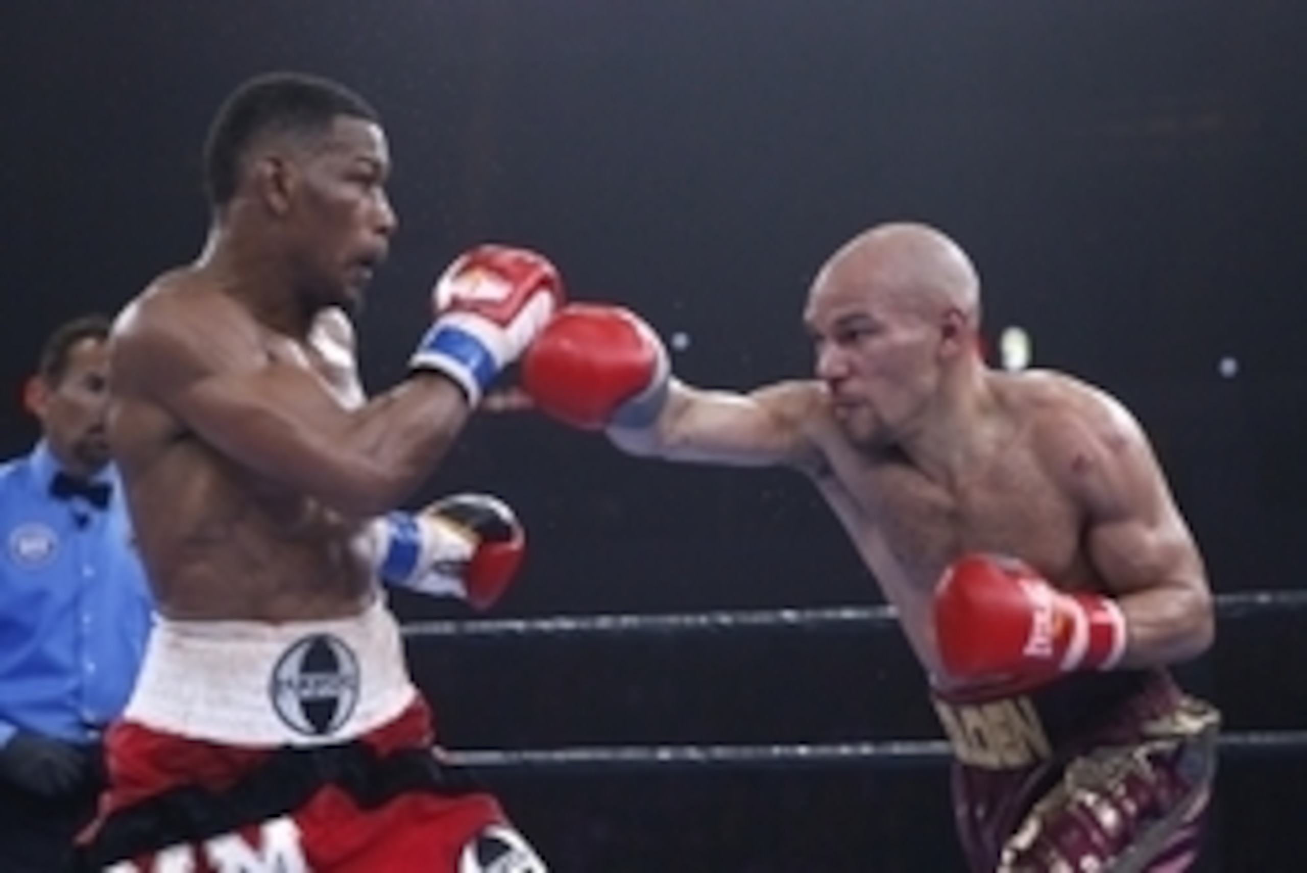 Apr 24, 2015; Chicago, IL, USA; Daniel Jacobs (left) and Caleb Truax (right) fight during the Premier Boxing Championships at UIC Pavilion. Mandatory Credit: Kamil Krzaczynski-USA TODAY Sports