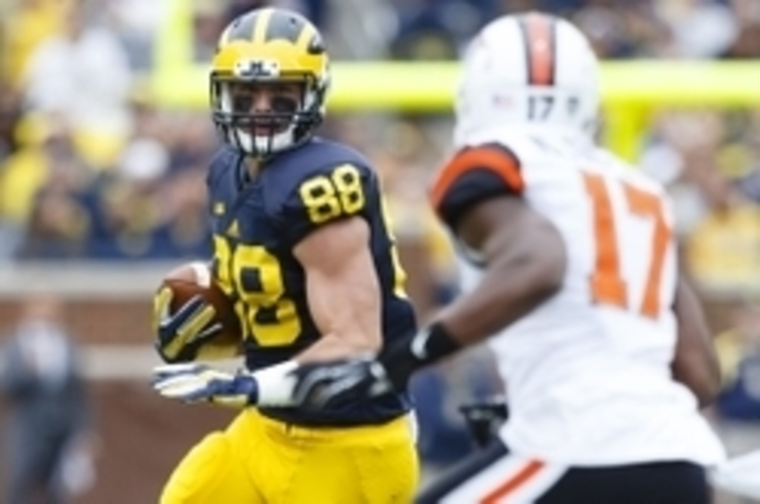 Sep 12, 2015; Ann Arbor, MI, USA; Michigan Wolverines tight end Jake Butt (88) runs the ball in the first quarter against the Oregon State Beavers at Michigan Stadium. Mandatory Credit: Rick Osentoski-USA TODAY Sports