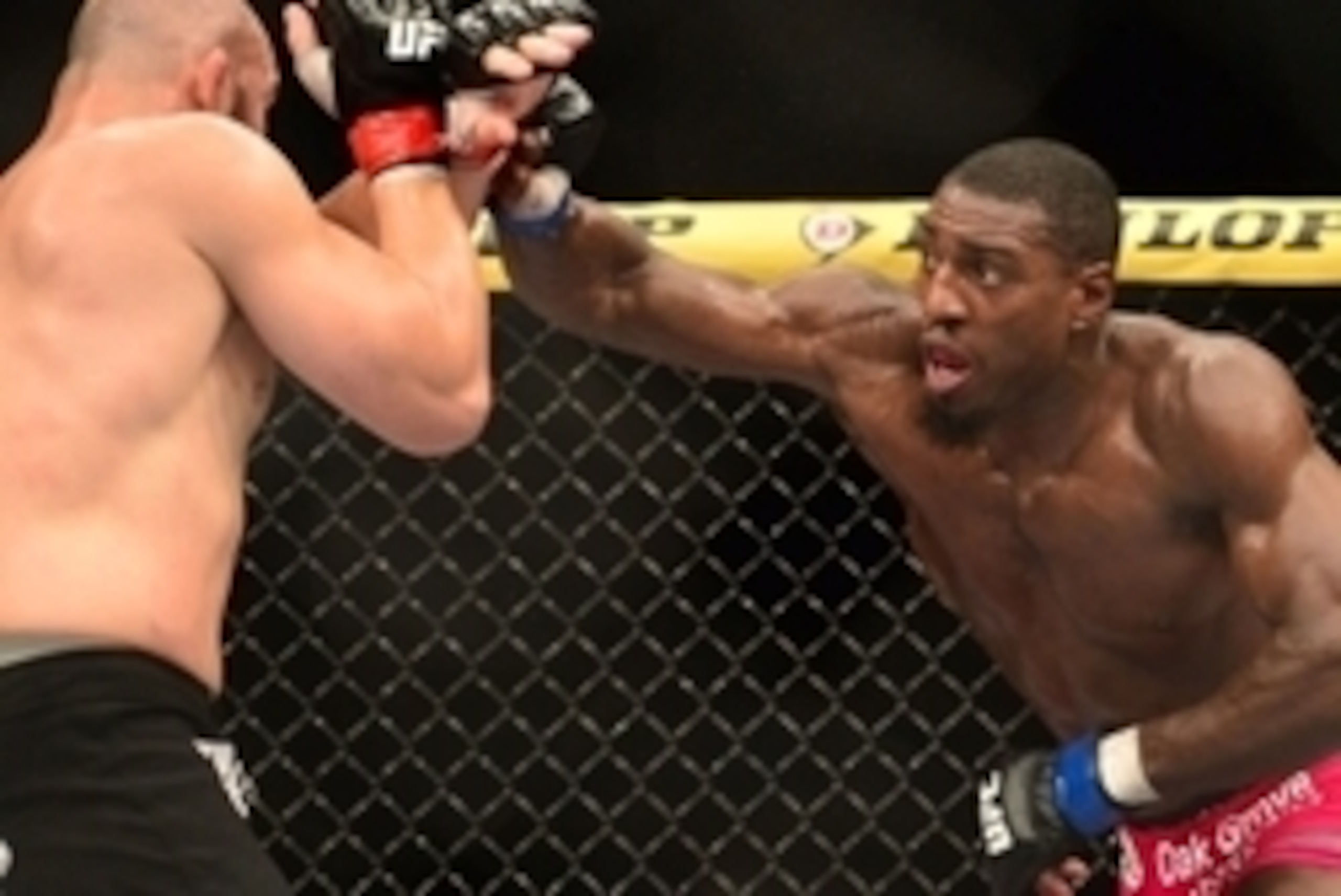 Oct 25, 2014; Rio de Janeiro, Brazil; Glover Teixeira (red gloves) fights Phil Davis (blue gloves) during UFC 179 at Ginasio do Maracanazinho. Mandatory Credit: Jason Silva-USA TODAY Sports
