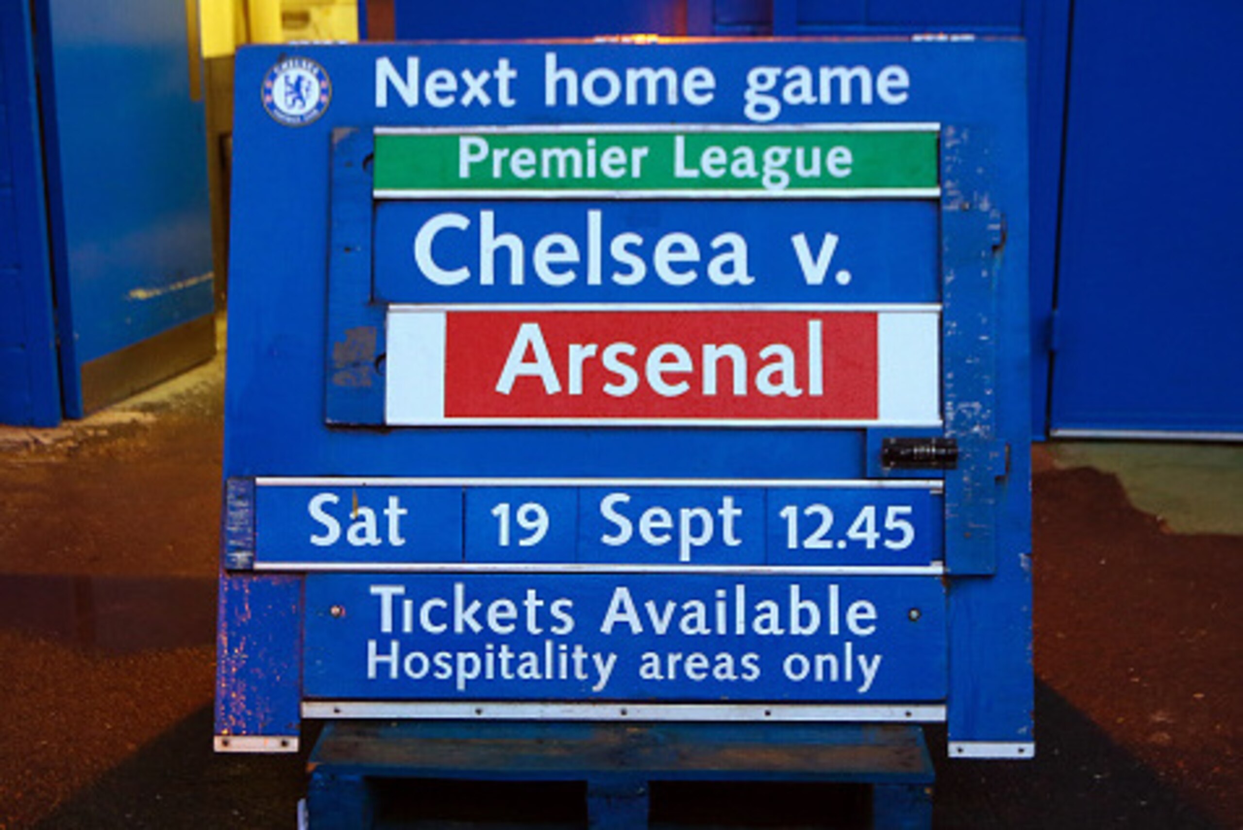 LONDON, ENGLAND - SEPTEMBER 16: A board advertising the next home game between Chelsea and Arsenal ahead of the UEFA Champions League match between Chelsea and Maccabi Tel-Aviv at Stamford Bridge on September 16, 2015 in London, United Kingdom. (Photo b LONDON, ENGLAND - SEPTEMBER 16: A board advertising the next home game between Chelsea and Arsenal ahead of the UEFA Champions League match between Chelsea and Maccabi Tel-Aviv at Stamford Bridge on September 16, 2015 in London, United Kingdom. (Photo b
