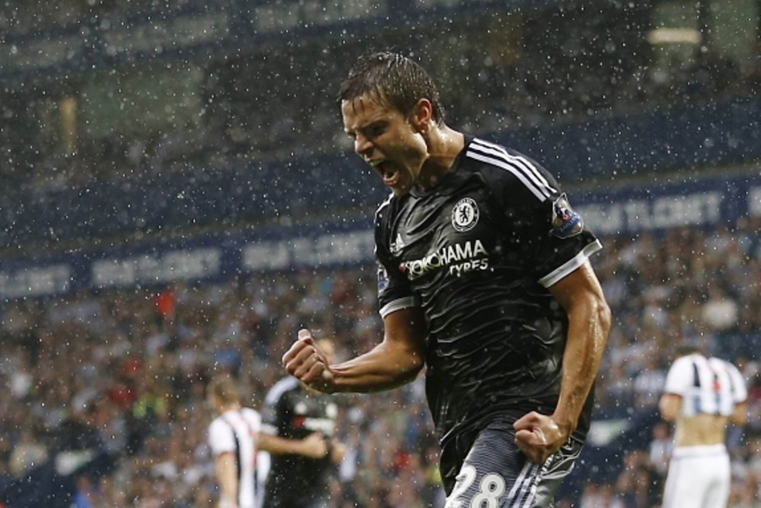 Chelsea's Spanish defender Cesar Azpilicueta celebrates after scoring their third goal during the English Premier League football match between West Bromwich Albion and Chelsea at The Hawthorns in West Bromwich, central England on August 23, 2015. AFP PHO