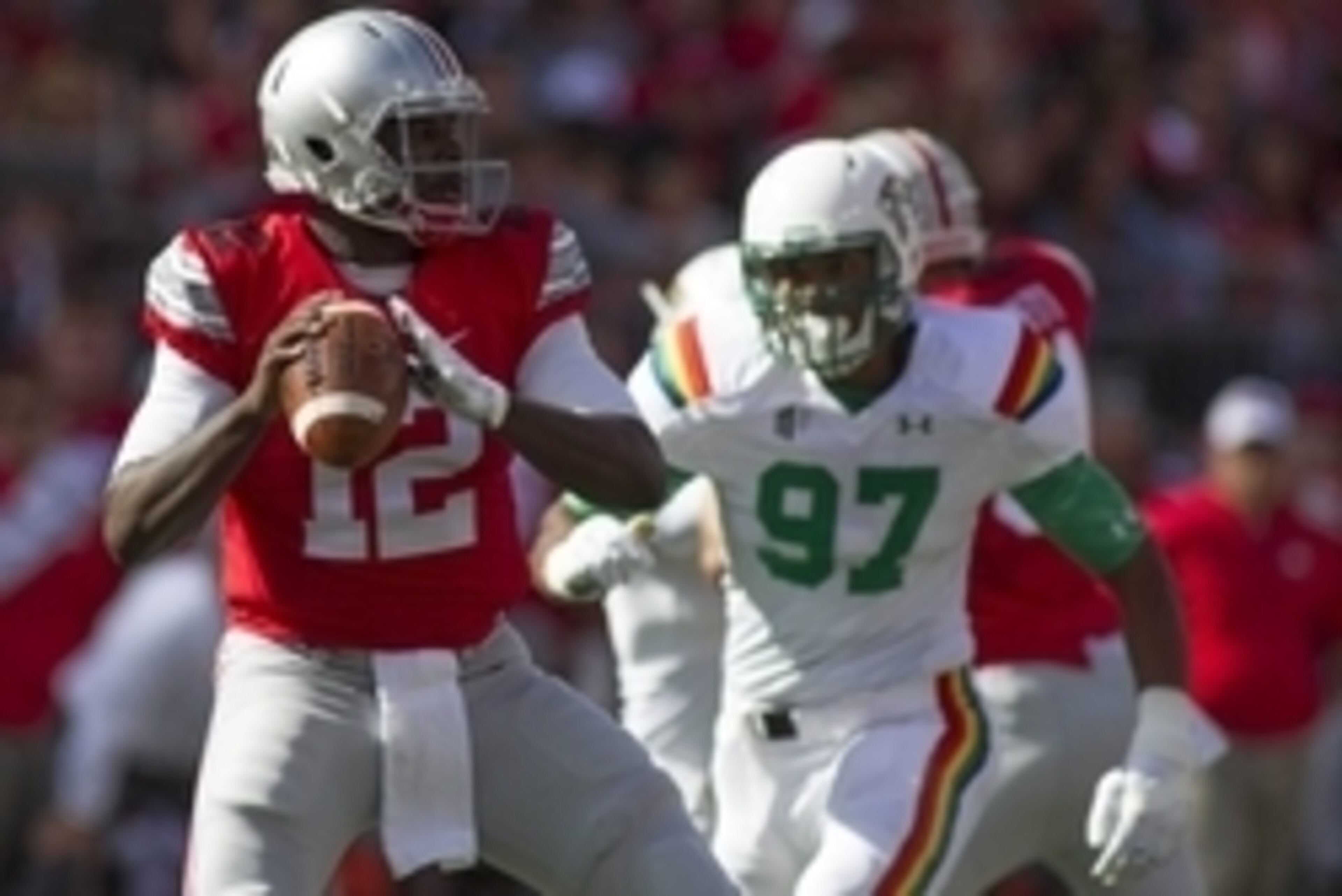 Sep 12, 2015; Columbus, OH, USA; Ohio State Buckeyes quarterback Cardale Jones (12) looks to pass the ball in the second quarter of the game against the Hawaii Warriors at Ohio Stadium. Mandatory Credit: Trevor Ruszkowski-USA TODAY Sports