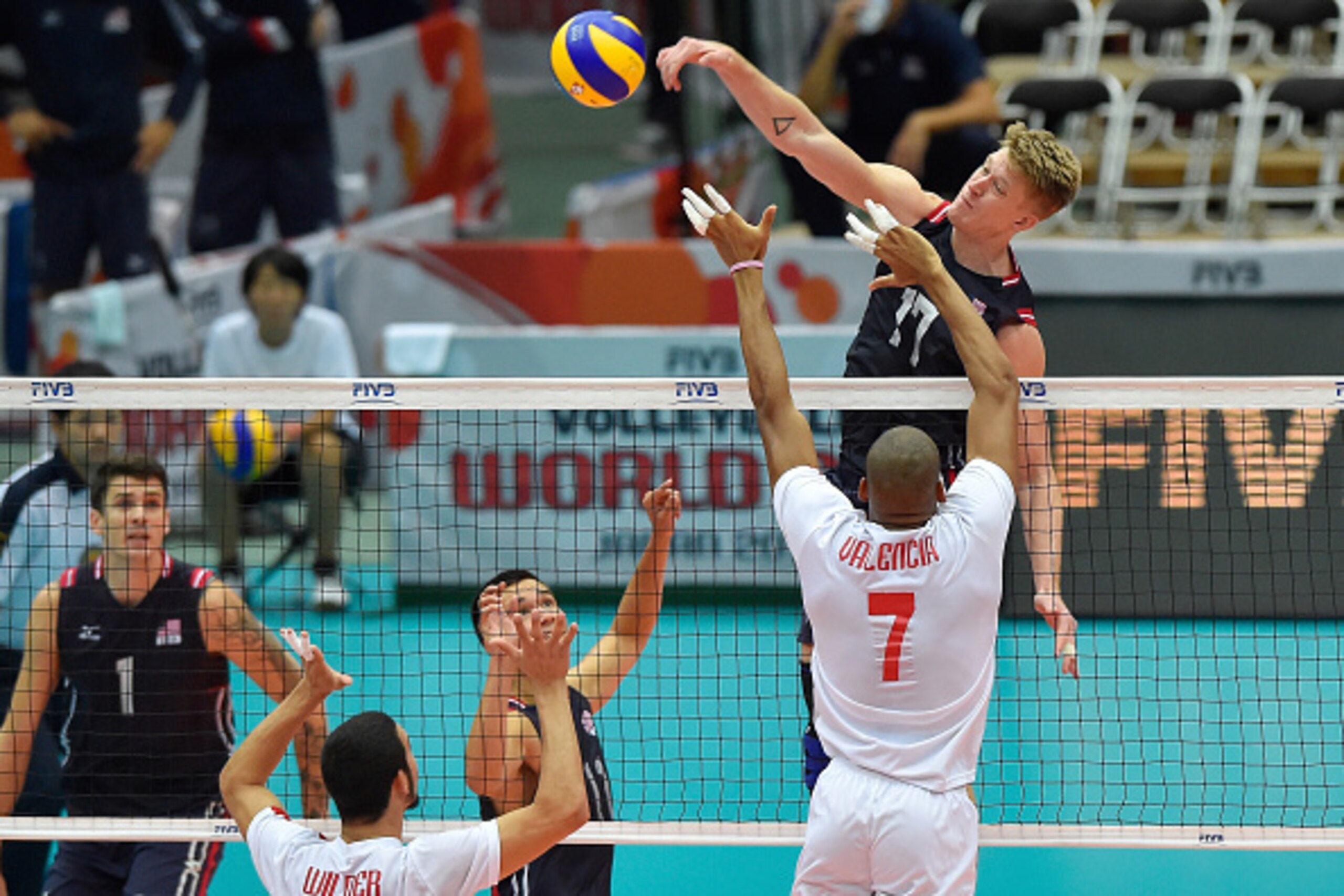 OSAKA, JAPAN - SEPTEMBER 16:  Maxwell Holt #17 of USA spikes the ball in the match between USA and Venezuela during the FIVB Men's Volleyball World Cup Japan 2015 at the Osaka Municipal Central Gymnasium on September 16, 2015 in Osaka, Japan.  (Photo by K