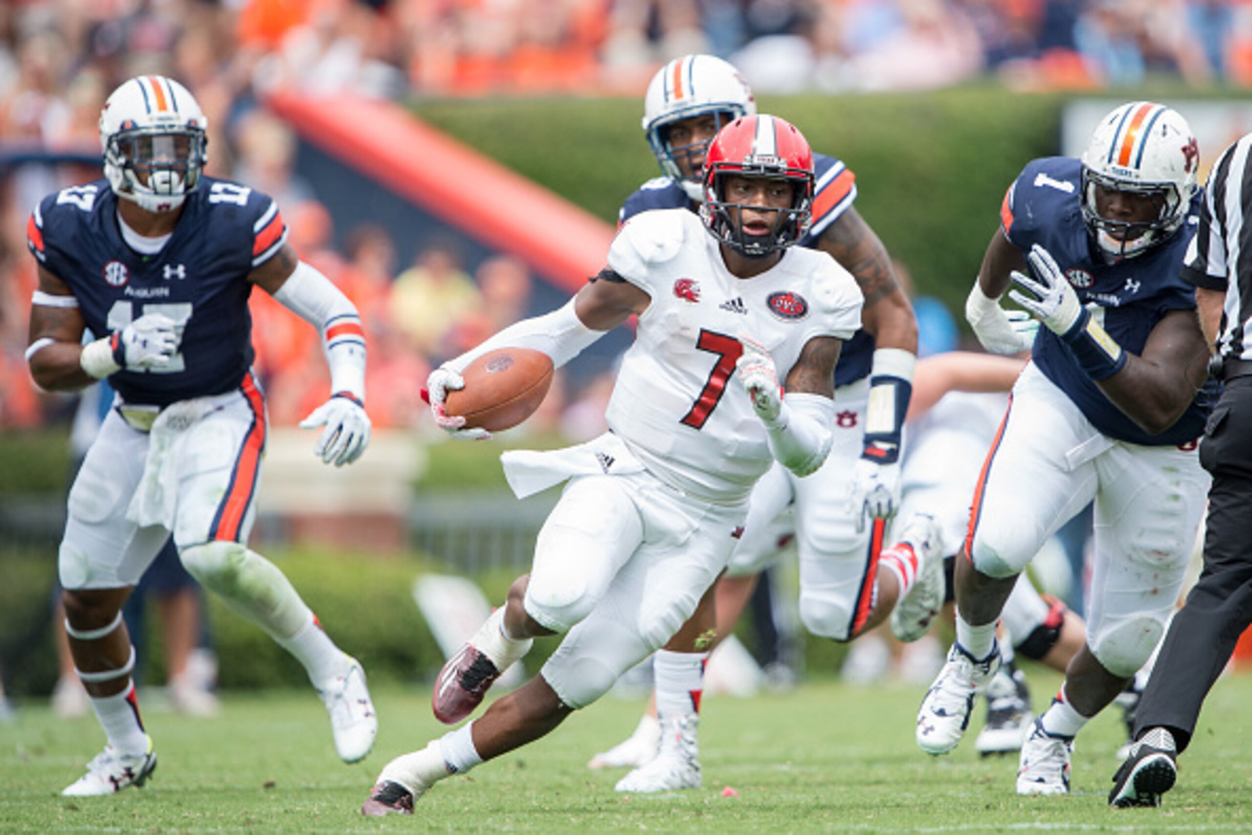 AUBURN, AL - SEPTEMBER 12: Quarterback Eli Jenkins #7 of the Jacksonville State Gamecocks runs the ball downfield during their game against the Auburn Tigers on September 12, 2015 at Jordan-Hare Stadium in Auburn, Alabama. The Auburn Tigers defeated the J