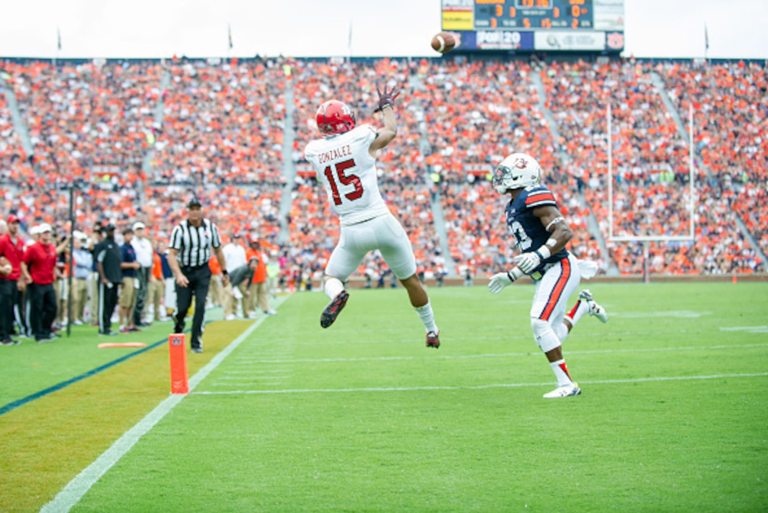 AUBURN, AL - SEPTEMBER 12: Wide receiver Ruben Gonzalez #15 of the Jacksonville State Gamecocks attempts to catch a pass in front of defensive back Johnathan Ford #23 of the Auburn Tigers on September 12, 2015 at Jordan-Hare Stadium in Auburn, Alabama. Th