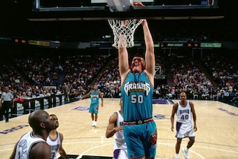 SACRAMENTO, CA - APRIL 8: Bryant Reeves #50 of the Vancouver Grizzlie dunks against the Sacramento Kings during a game played on April 8, 1997 at Arco Arena in Sacramento, California. NOTE TO USER: User expressly acknowledges and agrees that, by downloadi