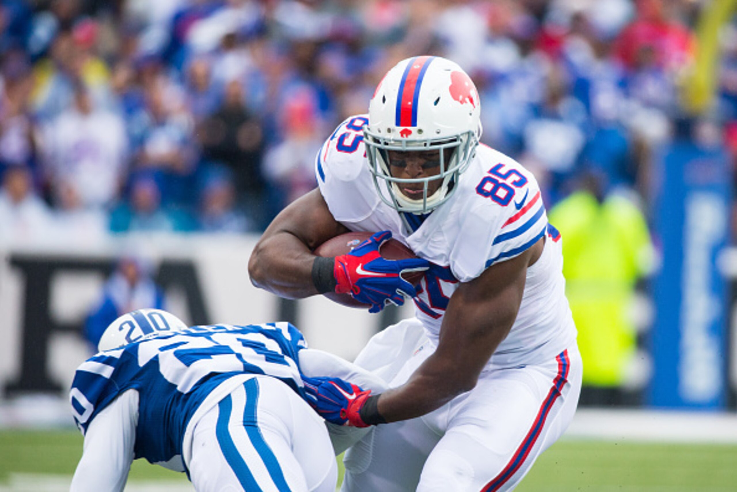 ORCHARD PARK, NY - SEPTEMBER 13: Charles Clay #85 of the Buffalo Bills shakes a tackle from Darius Butler #20 of the Indianapolis Colts during the first half on September 13, 2015 at Ralph Wilson Stadium in Orchard Park, New York. Buffalo defeats Indian ORCHARD PARK, NY - SEPTEMBER 13: Charles Clay #85 of the Buffalo Bills shakes a tackle from Darius Butler #20 of the Indianapolis Colts during the first half on September 13, 2015 at Ralph Wilson Stadium in Orchard Park, New York. Buffalo defeats Indian