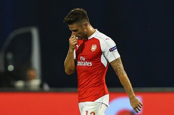 ZAGREB, CROATIA - SEPTEMBER 16:  Olivier Giroud of Arsenal walks off after being shown the red card by referee Ovidiu Hategan during the UEFA Champions League Group F match between Dinamo Zagreb and Arsenal at Maksimir Stadium on September 16, 2015 in Zag