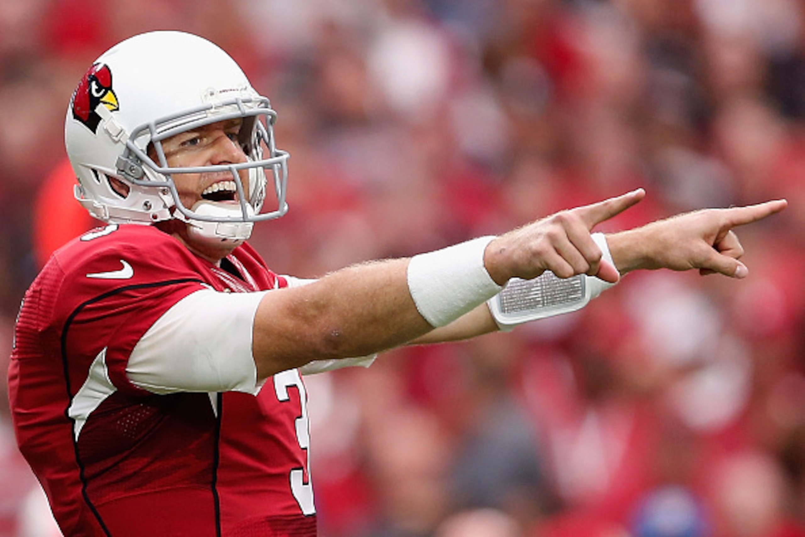 GLENDALE, AZ - SEPTEMBER 13:  Quarterback Carson Palmer #3 of the Arizona Cardinals prepares to snap the football during the NFL game against the New Orleans Saints at the University of Phoenix Stadium on September 13, 2015 in Glendale, Arizona.  (Photo b