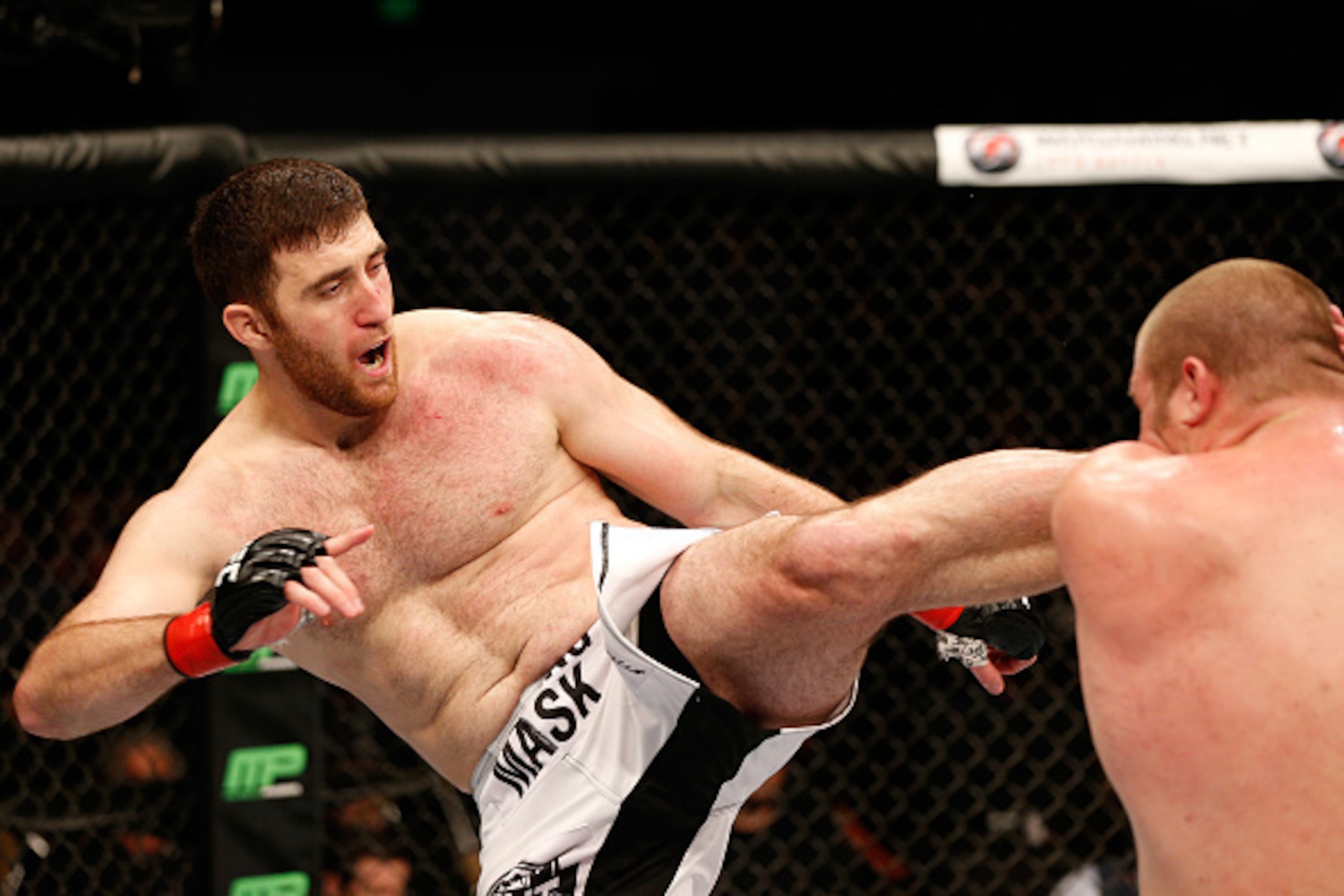 AUSTIN, TX - NOVEMBER 22: (L-R) Ruslan Magomedov of Russia kicks Josh Copeland in their heavyweight bout during the UFC Fight Night event at The Frank Erwin Center on November 22, 2014 in Austin, Texas. (Photo by Josh Hedges/Zuffa LLC/Zuffa LLC via Gett AUSTIN, TX - NOVEMBER 22: (L-R) Ruslan Magomedov of Russia kicks Josh Copeland in their heavyweight bout during the UFC Fight Night event at The Frank Erwin Center on November 22, 2014 in Austin, Texas. (Photo by Josh Hedges/Zuffa LLC/Zuffa LLC via Gett