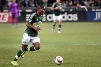 Sep 9, 2015; Portland, OR, USA; Portland Timbers forward/midfielder Darlington Nagbe brings the ball up the field during the second half of the game against the Sporting KC at Providence Park. Mandatory Credit: Steve Dykes-USA TODAY Sports Sep 9, 2015; Portland, OR, USA; Portland Timbers forward/midfielder Darlington Nagbe brings the ball up the field during the second half of the game against the Sporting KC at Providence Park. Mandatory Credit: Steve Dykes-USA TODAY Sports