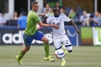 Aug 1, 2015; Seattle, WA, USA; Vancouver Whitecaps midfielder Kekuta Manneh (23) gets past Seattle Sounders FC defender Dylan Remick (15) during the first half at CenturyLink Field. Vancouver defeated Seattle, 3-0. Mandatory Credit: Joe Nicholson-USA TODA Aug 1, 2015; Seattle, WA, USA; Vancouver Whitecaps midfielder Kekuta Manneh (23) gets past Seattle Sounders FC defender Dylan Remick (15) during the first half at CenturyLink Field. Vancouver defeated Seattle, 3-0. Mandatory Credit: Joe Nicholson-USA TODA