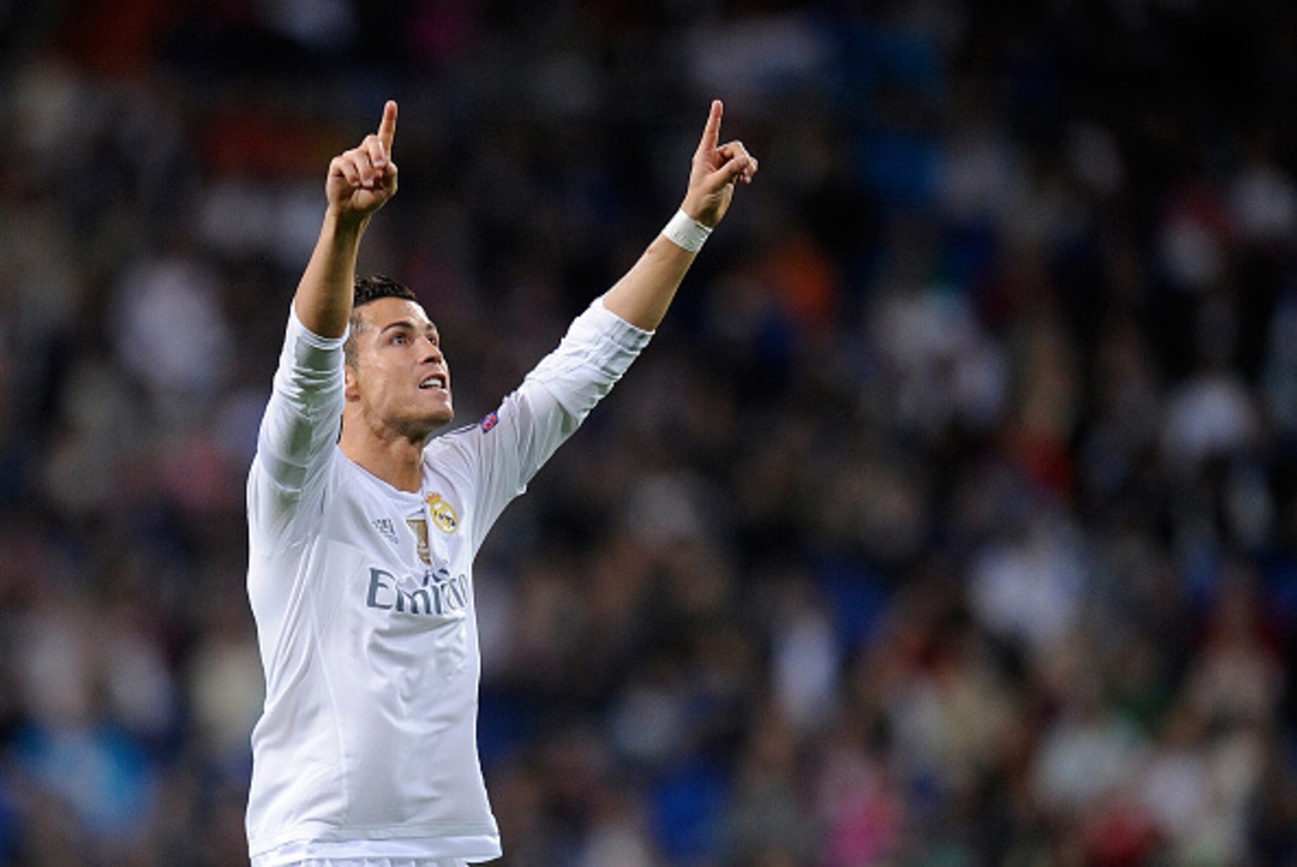 MADRID, SPAIN - SEPTEMBER 15:  Cristiano Ronaldo of Real Madrid celebrates after scoring Real's 3rd goal from the penalty spot during the UEFA Champions League Group A match between Real Madrid and Shakhtar Donetsk at estadio Santiago Bernabeu on Septembe
