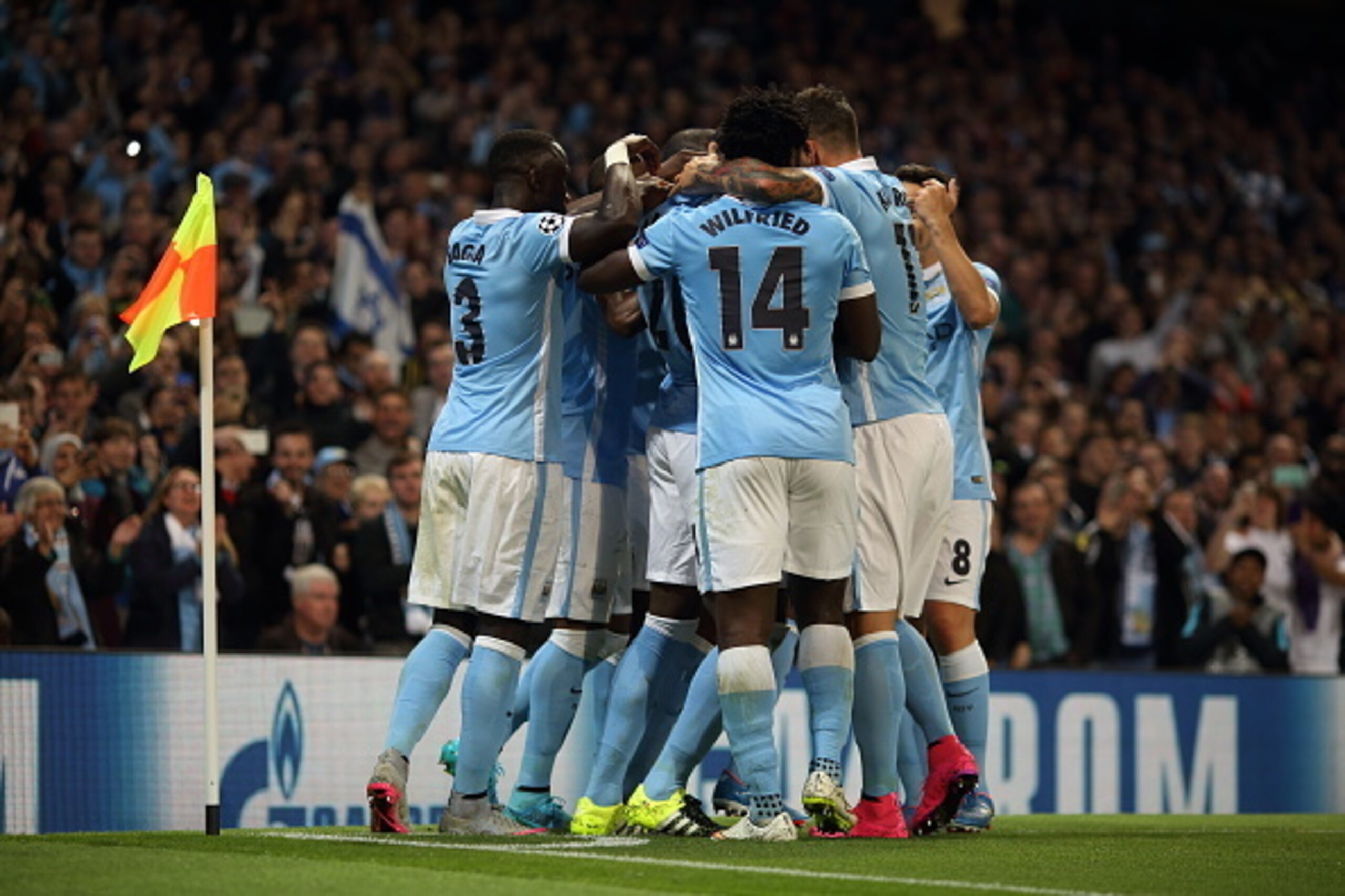 MANCHESTER, ENGLAND - SEPTEMBER 15: Vincent Kompany of Manchester City celebrates with his team-mates after Giorgio Chiellini of Juventus scored an own goal to make it 1-0 during the UEFA Champions League Group D match between Manchester City FC and Juv MANCHESTER, ENGLAND - SEPTEMBER 15: Vincent Kompany of Manchester City celebrates with his team-mates after Giorgio Chiellini of Juventus scored an own goal to make it 1-0 during the UEFA Champions League Group D match between Manchester City FC and Juv
