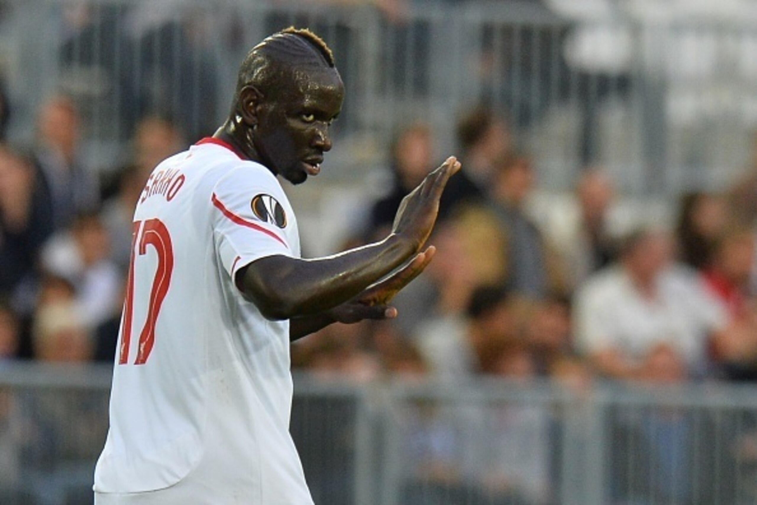 Liverpool's French defender Mamadou Sakho gestures during the group B, UEFA Europa League football match between Bordeaux vs Liverpool on September 17, 2015 at the Matmut Atlantique Stadium in Bordeaux.  AFP PHOTO / NICOLAS TUCAT        (Photo credit shou