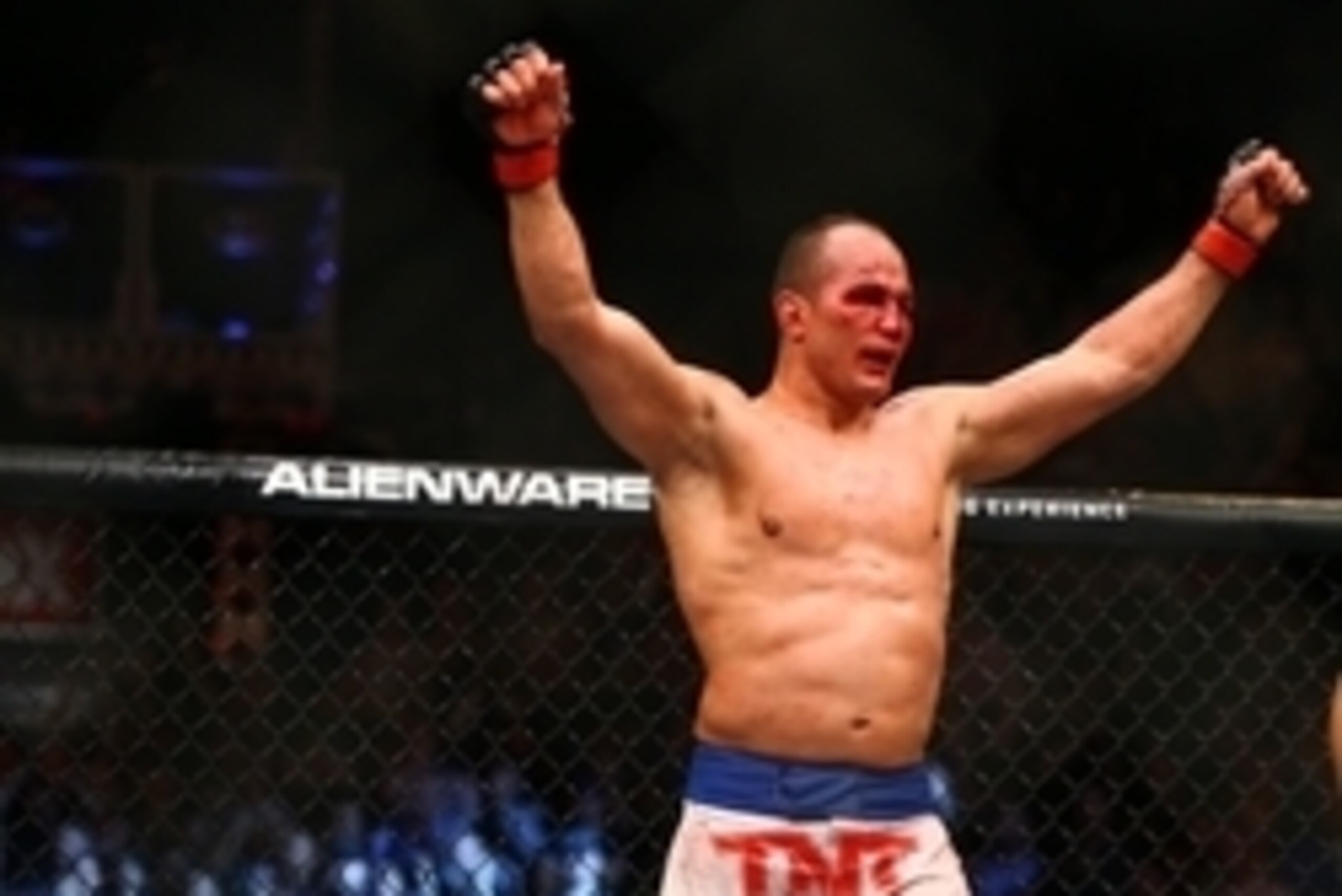 December 13, 2014; Phoenix, AZ, USA; Junior Dos Santos celebrates following his fight against Stipe Miocic (not pictured) during UFC Fight Night at US Airways Center. Mandatory Credit: Mark J. Rebilas-USA TODAY Sports