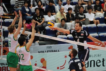 TOYAMA, JAPAN - SEPTEMBER 18:  Bartosz Kurek of Poland attacks in the match between Australia and Poland during the FIVB Men's Volleyball World Cup Japan 2015 at the Toyama City Gymnasium on September 18, 2015 in Toyama, Japan.  (Photo by Masashi Hara/Get