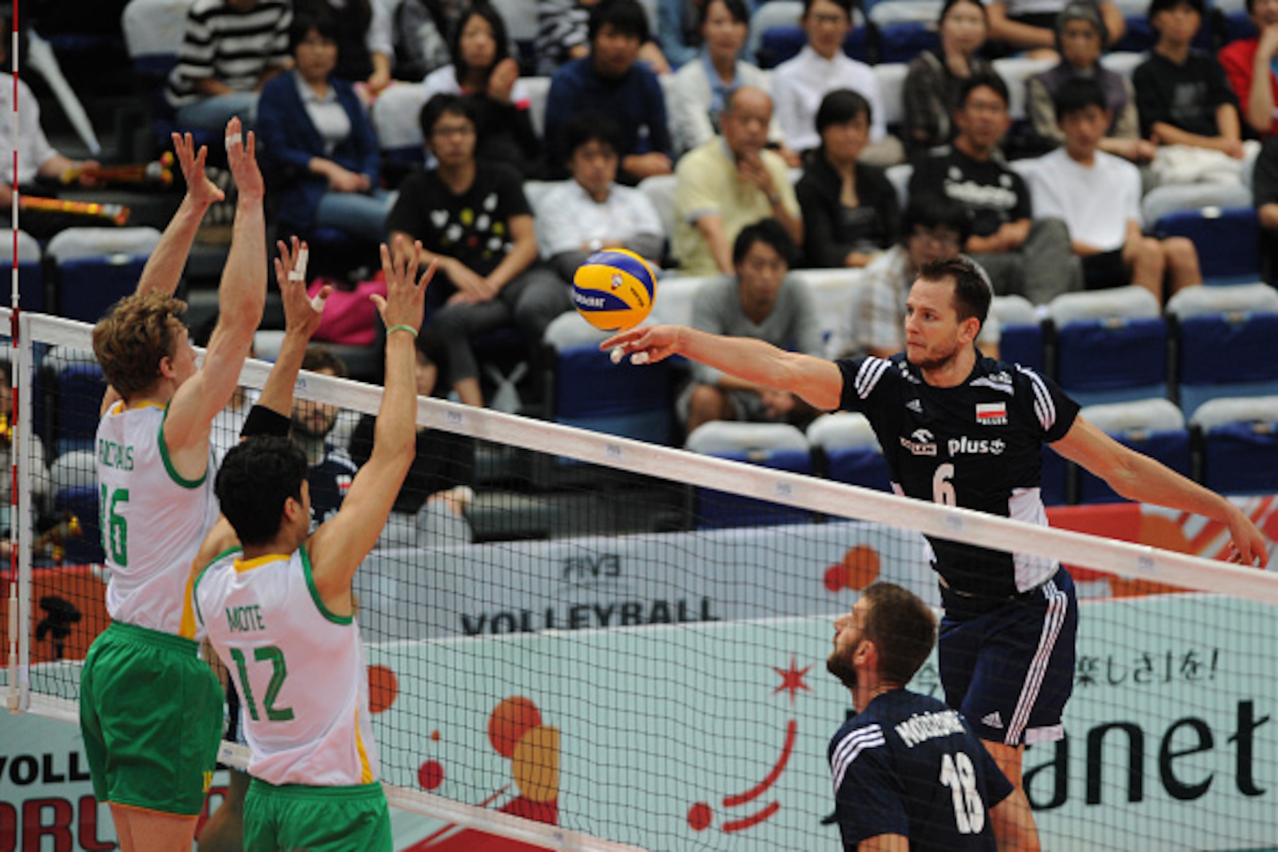 TOYAMA, JAPAN - SEPTEMBER 18:  Bartosz Kurek of Poland attacks in the match between Australia and Poland during the FIVB Men's Volleyball World Cup Japan 2015 at the Toyama City Gymnasium on September 18, 2015 in Toyama, Japan.  (Photo by Masashi Hara/Get