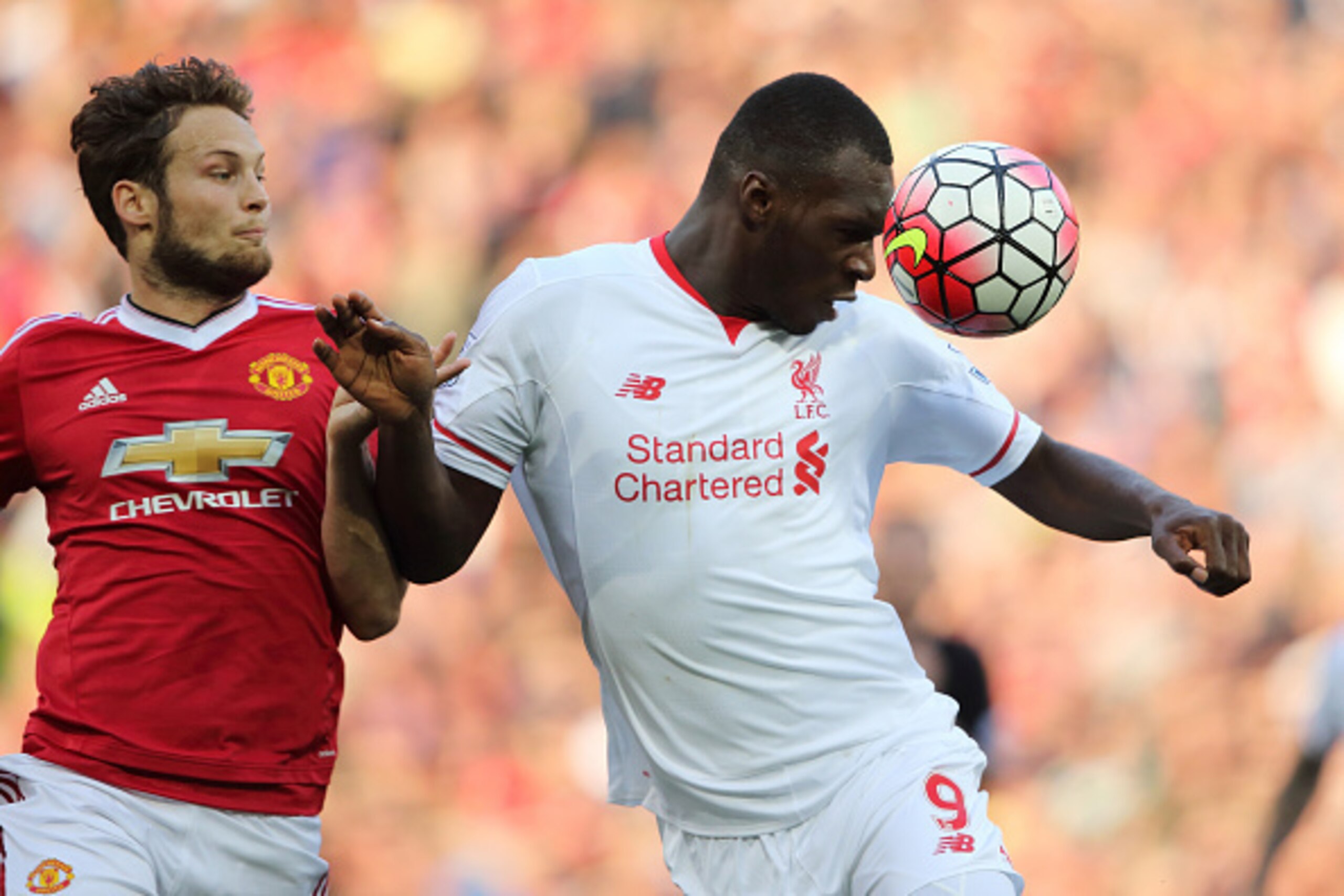 MANCHESTER, ENGLAND - SEPTEMBER 12: Daley Blind of Manchester United and Christian Benteke of Liverpool during the Barclays Premier League match between Manchester United and Liverpool on September 12, 2015 in Manchester, United Kingdom.  (Photo by Matthe