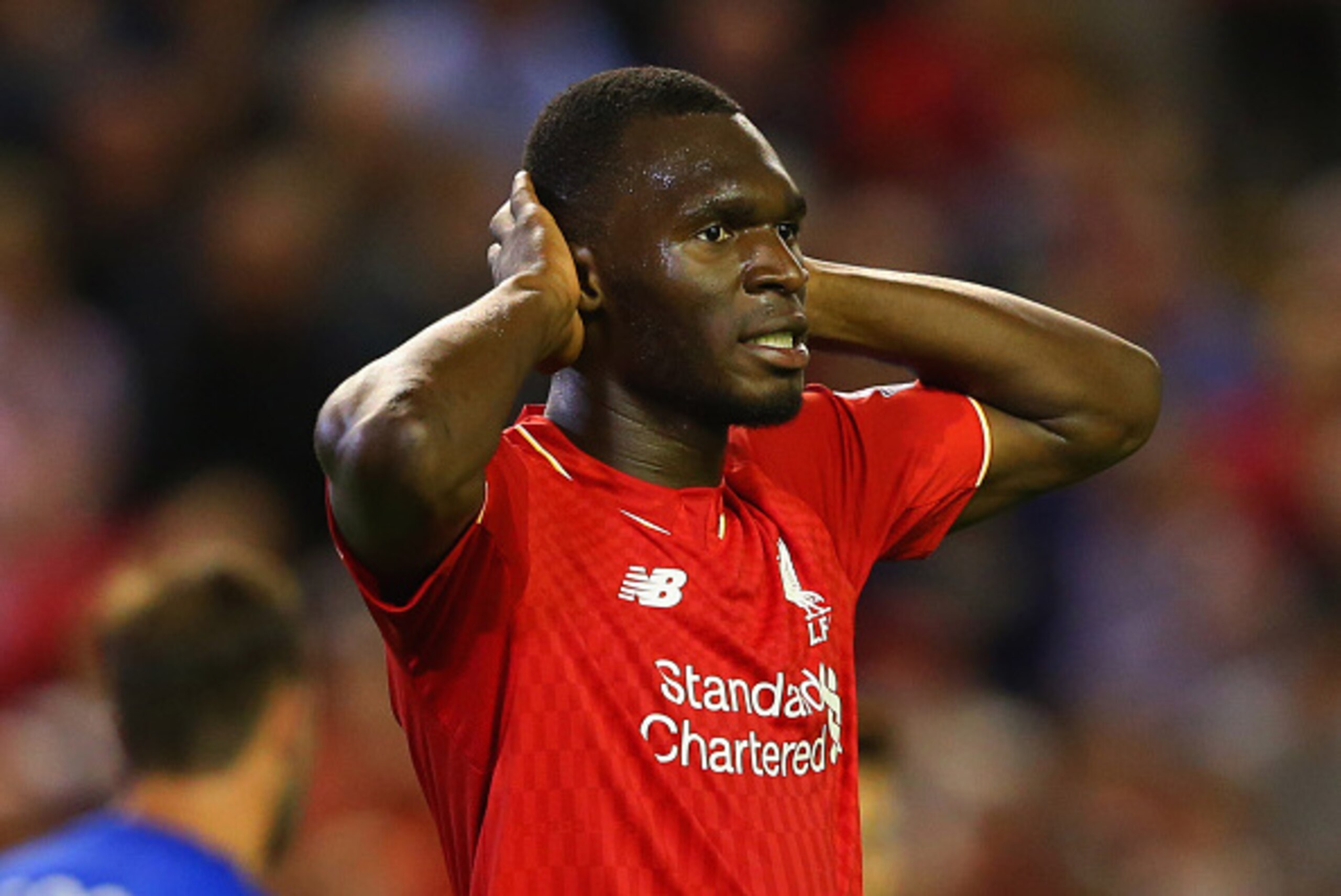 LIVERPOOL, ENGLAND - AUGUST 17:  Christian Benteke of Liverpool reacts after a missed chance during the Barclays Premier League match between Liverpool and A.F.C. Bournemouth at Anfield on August 17, 2015 in Liverpool, United Kingdom.  (Photo by Alex Live