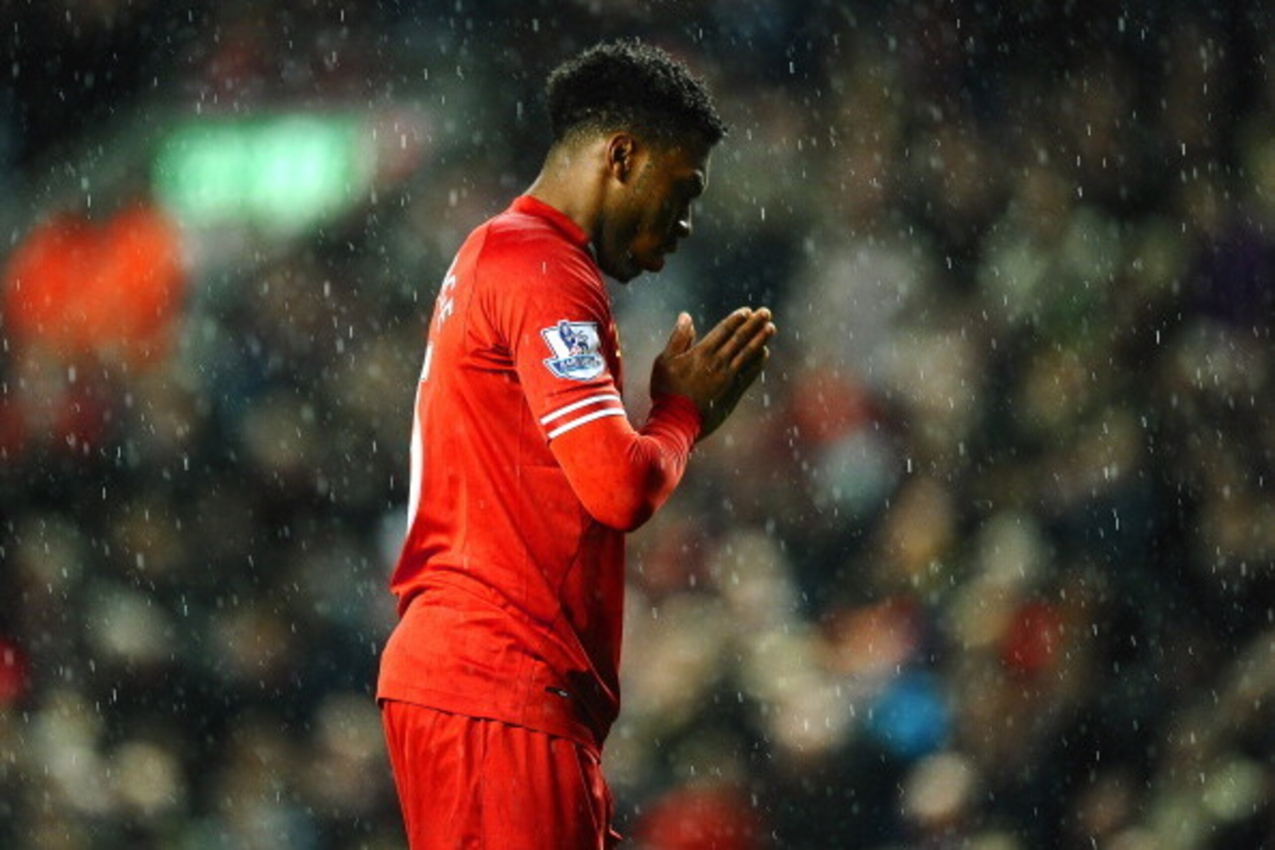 LIVERPOOL, ENGLAND - JANUARY 28:  Daniel Sturridge of Liverpool reacts after missing a penalty during the Barclays Premier League match between Liverpool and Everton at Anfield on January 28, 2014 in Liverpool, England.  (Photo by Laurence Griffiths/Getty