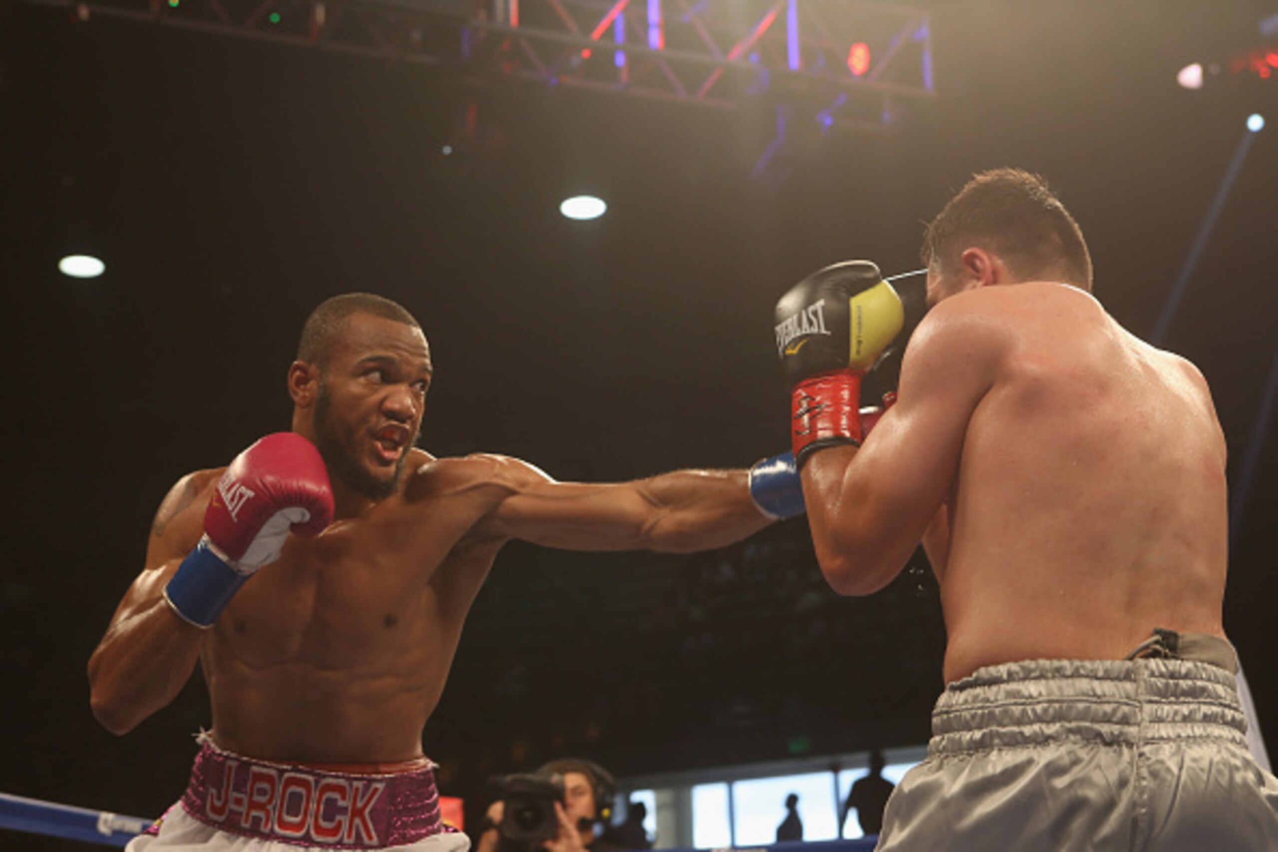 BIRMINGHAM, AL - JUNE 13:  Julian Williams (L) lands a punch on Armen Ovsepyan (R) on June 13, 2015 in Birmingham, Alabama.  (Photo by David A. Smith/Getty Images)