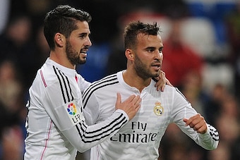 MADRID, SPAIN - DECEMBER 02:  Jese Rodriguez of Real Madrid celebrates with Isco after scoring Real's 5th goal during the Copa Del Rey Round of 32, Second Leg match between Real Madrid CF and Cornella at Santiago Bernabeu stadium on December 2, 2014 in Ma
