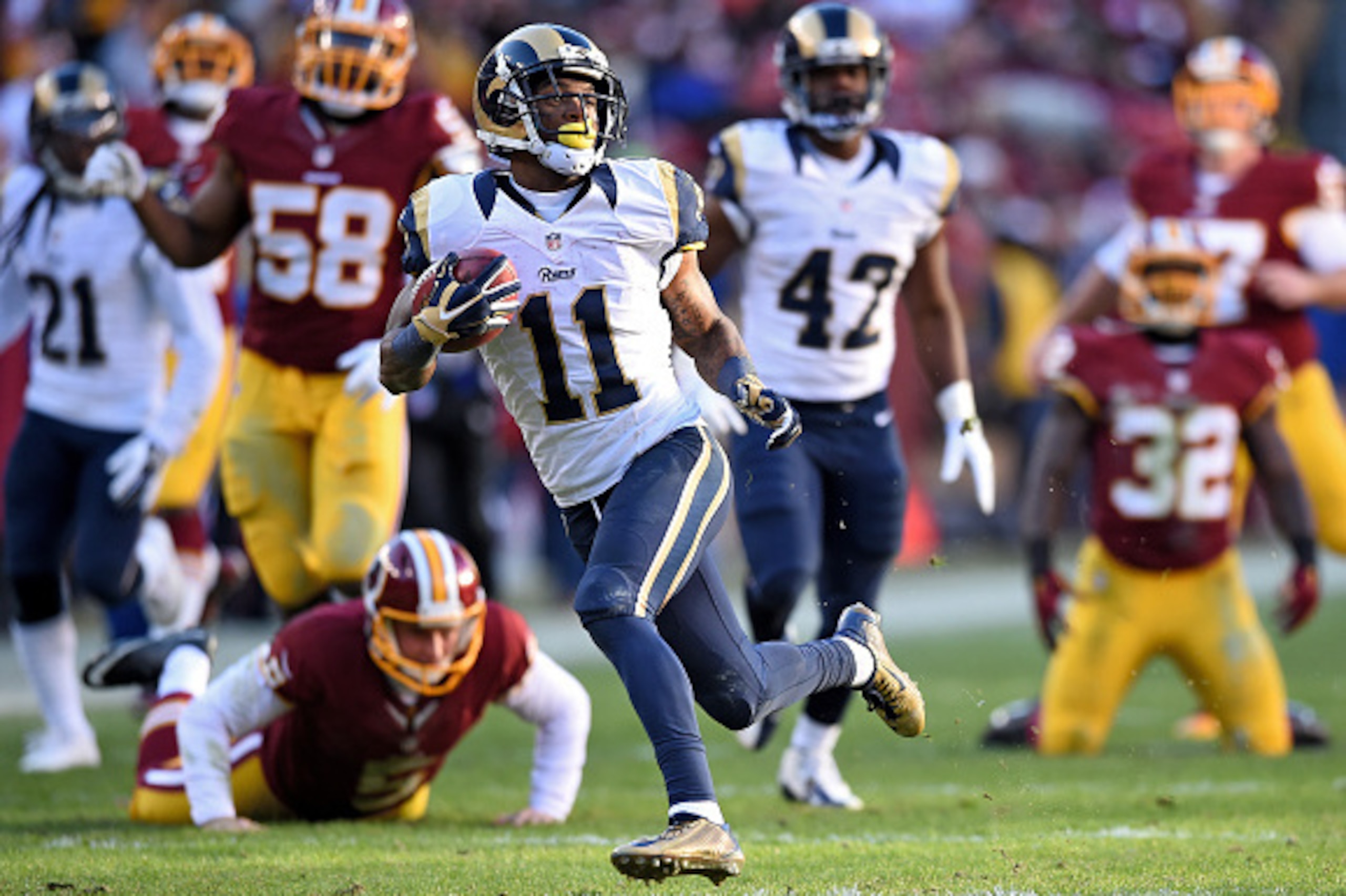 LANDOVER, MD - DECEMBER 07: Wide receiver Tavon Austin #11 of the St. Louis Rams scores a third quarter punt return touchdown against the Washington Redskins at FedExField on December 7, 2014 in Landover, Maryland. (Photo by Patrick Smith/Getty Images) LANDOVER, MD - DECEMBER 07: Wide receiver Tavon Austin #11 of the St. Louis Rams scores a third quarter punt return touchdown against the Washington Redskins at FedExField on December 7, 2014 in Landover, Maryland. (Photo by Patrick Smith/Getty Images)