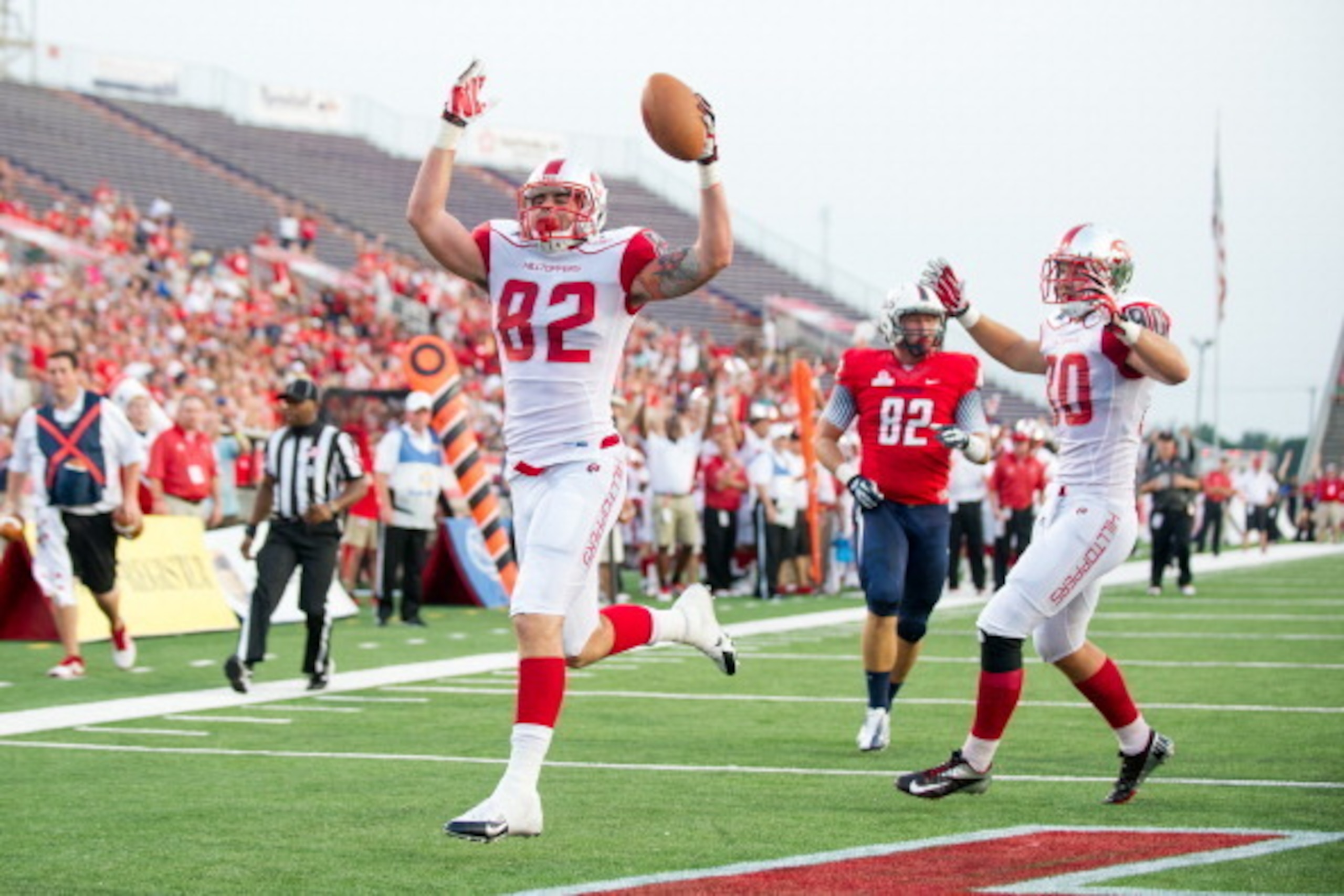 MOBILE, AL - SEPTEMBER 14: Tight end Tyler Higbee #82 of the Western Kentucky Hilltoppers celebrates after scoring a touchdown during their game against the South Alabama Jaguars on September 14, 2013 at Ladd-Peebles Stadium in Mobile, Alabama. At halftim