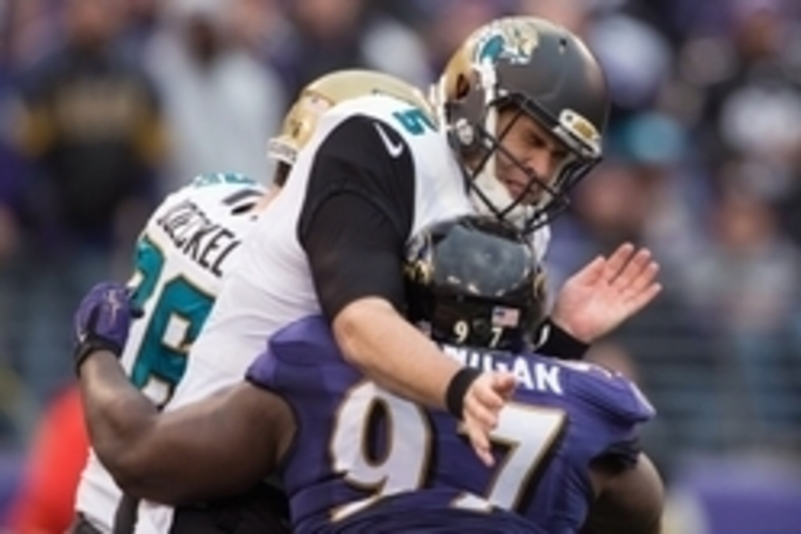 Dec 14, 2014; Baltimore, MD, USA; Baltimore Ravens defensive tackle Timmy Jernigan (97) hits Jacksonville Jaguars quarterback Blake Bortles (5) during the third quarter at M&T Bank Stadium. Baltimore Ravens defeated Jacksonville Jaguars 20-12. Mandatory Dec 14, 2014; Baltimore, MD, USA; Baltimore Ravens defensive tackle Timmy Jernigan (97) hits Jacksonville Jaguars quarterback Blake Bortles (5) during the third quarter at M&T Bank Stadium. Baltimore Ravens defeated Jacksonville Jaguars 20-12. Mandatory