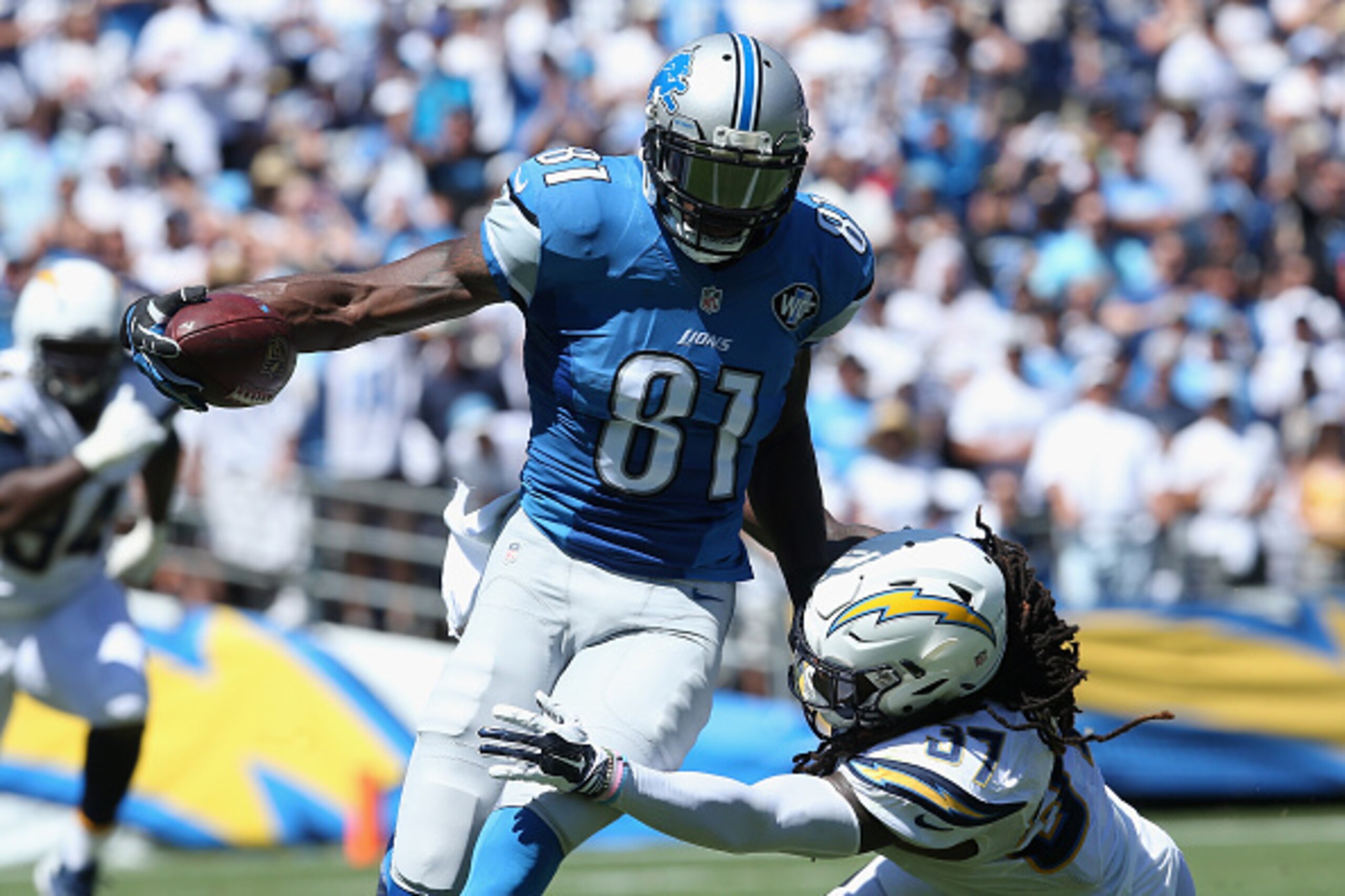 SAN DIEGO, CA - SEPTEMBER 13: Wide receiver Calvin Johnson #81 of the Detroit Lions is tackled by defensive back Jahleel Addae #37 of the San Diego Chargers at Qualcomm Stadium on September 13, 2015 in San Diego, California. (Photo by Stephen Dunn/Getty SAN DIEGO, CA - SEPTEMBER 13: Wide receiver Calvin Johnson #81 of the Detroit Lions is tackled by defensive back Jahleel Addae #37 of the San Diego Chargers at Qualcomm Stadium on September 13, 2015 in San Diego, California. (Photo by Stephen Dunn/Getty