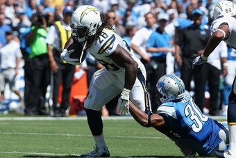 SAN DIEGO, CA - SEPTEMBER 13:  Running back Melvin Gordon #28 of the San Diego Chargers is pursued by defensive back Josh Wilson #30 of the Detroit Lions at Qualcomm Stadium on September 13, 2015 in San Diego, California.  (Photo by Stephen Dunn/Getty Ima