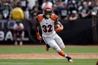 OAKLAND, CA - SEPTEMBER 13:  Jeremy Hill #32 of the Cincinnati Bengals carries the ball against the Oakland Raiders during their NFL game at the O.co Coliseum on September 13, 2015 in Oakland, California.  (Photo by Thearon W. Henderson/Getty Images)