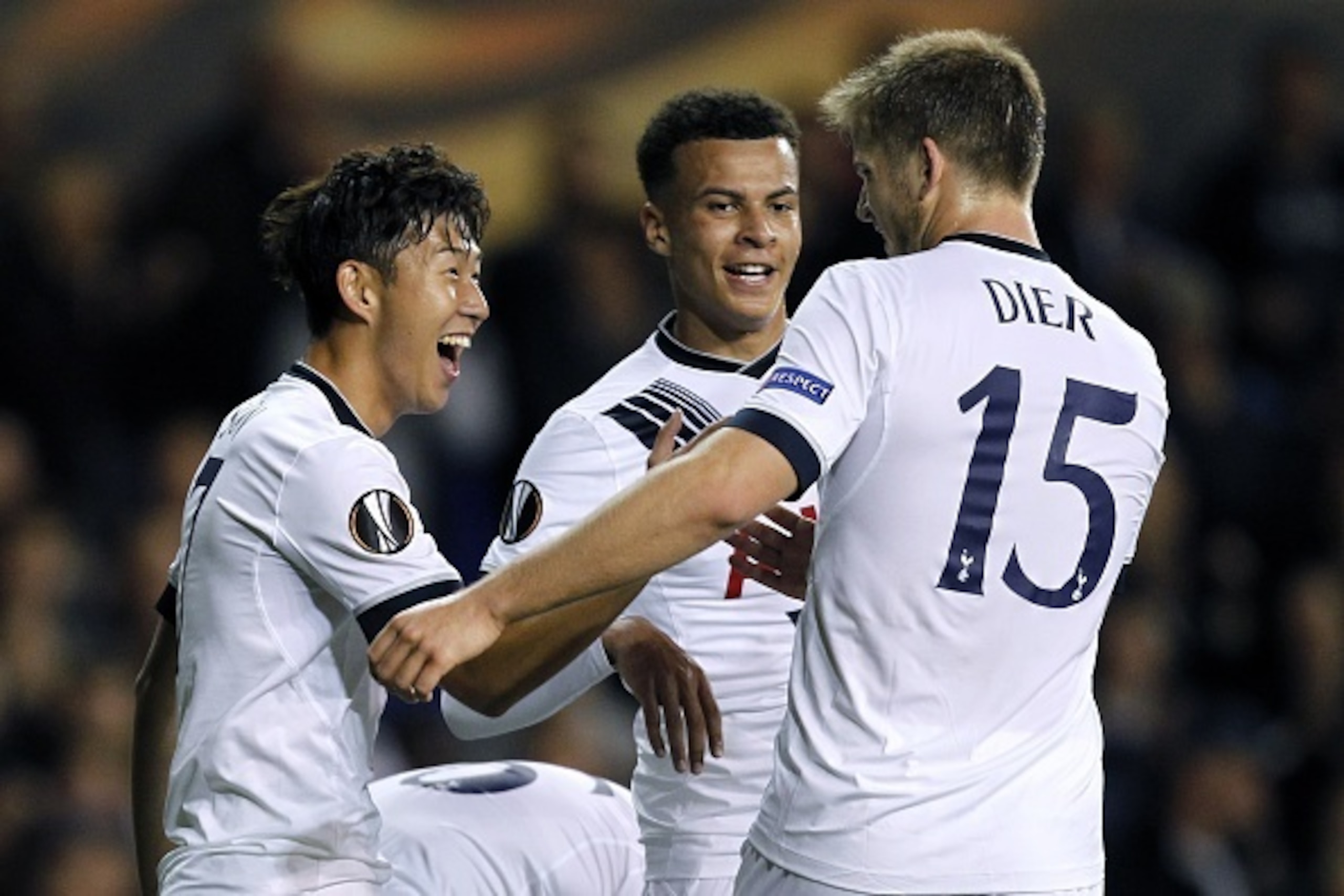 Tottenham Hotspur's South Korean striker Son Heung-Min (L) celebrates with Tottenham Hotspur's English defender Eric Dier (R) and Tottenham Hotspur's English midfielder Dele Alli (C) after scoring his second goal  during the UEFA Europa League Group J foo