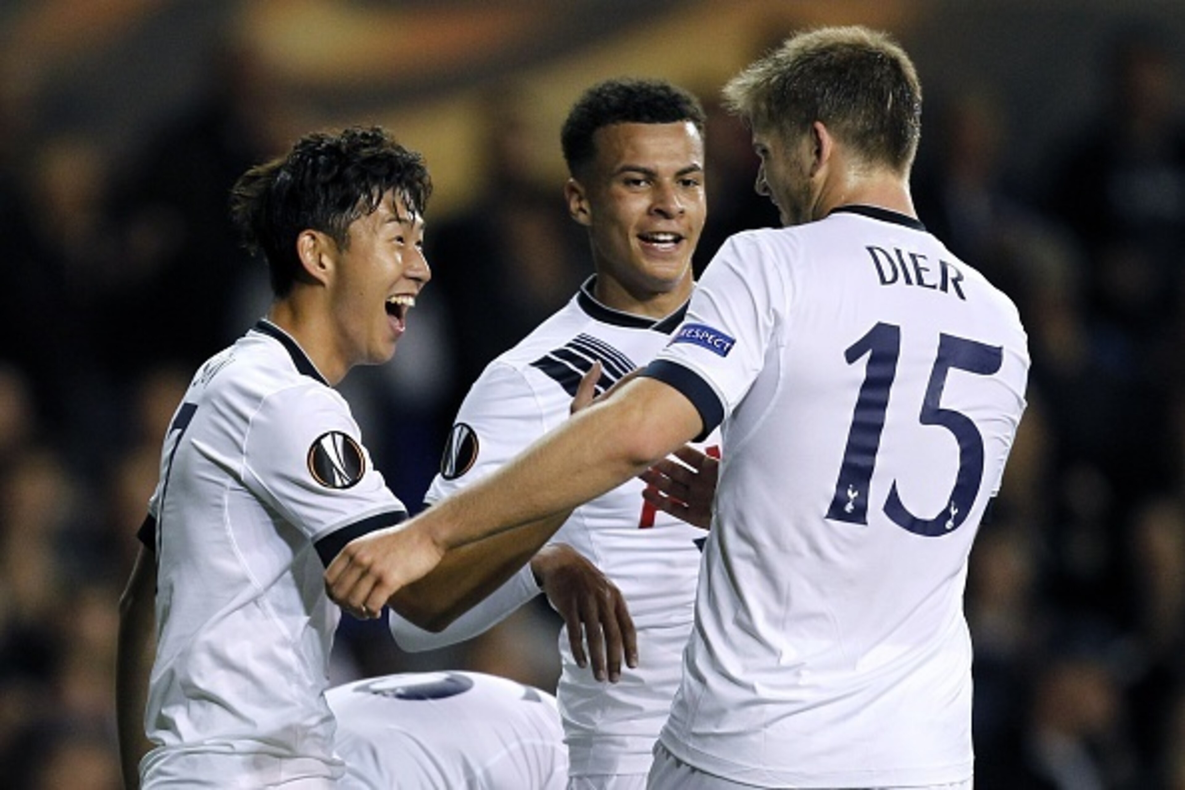 Tottenham Hotspur's South Korean striker Son Heung-Min (L) celebrates with Tottenham Hotspur's English defender Eric Dier (R) and Tottenham Hotspur's English midfielder Dele Alli (C) after scoring his second goal  during the UEFA Europa League Group J foo
