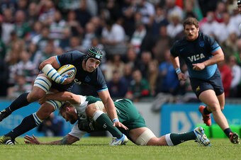 LEICESTER, ENGLAND - SEPTEMBER 05: Tomas Lavanini of Argentina is tackled by Laurence Pearce of Leicester Tigers during the Testimonial Challenge match between Leicester Tigers and Argentina at Welford Road on September 5, 2015 in Leicester, England.  (Ph