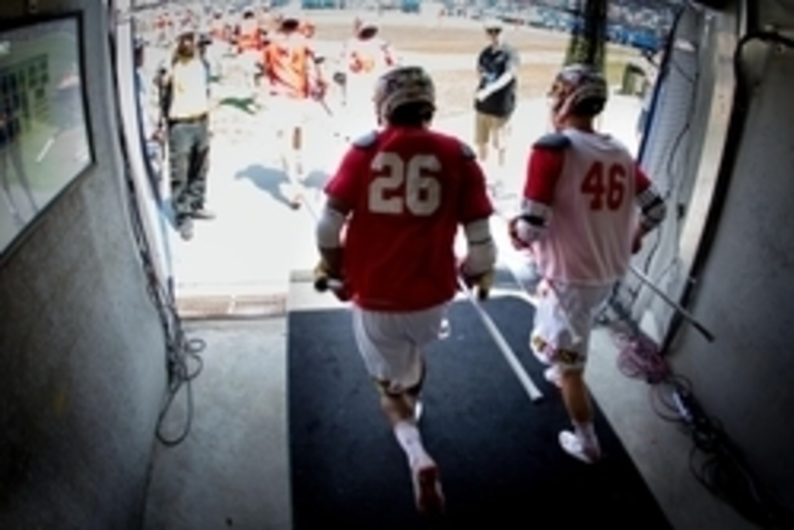 May 25, 2015; Philadelphia, PA, USA; Maryland Terrapins midfielder Isaiah Davis-Allen (26) and midfielder Joseph Fitzpatrick (46) run out of the tunnel for warm ups before a game against the Denver Pioneers in the NCAA division I men's lacrosse championsh