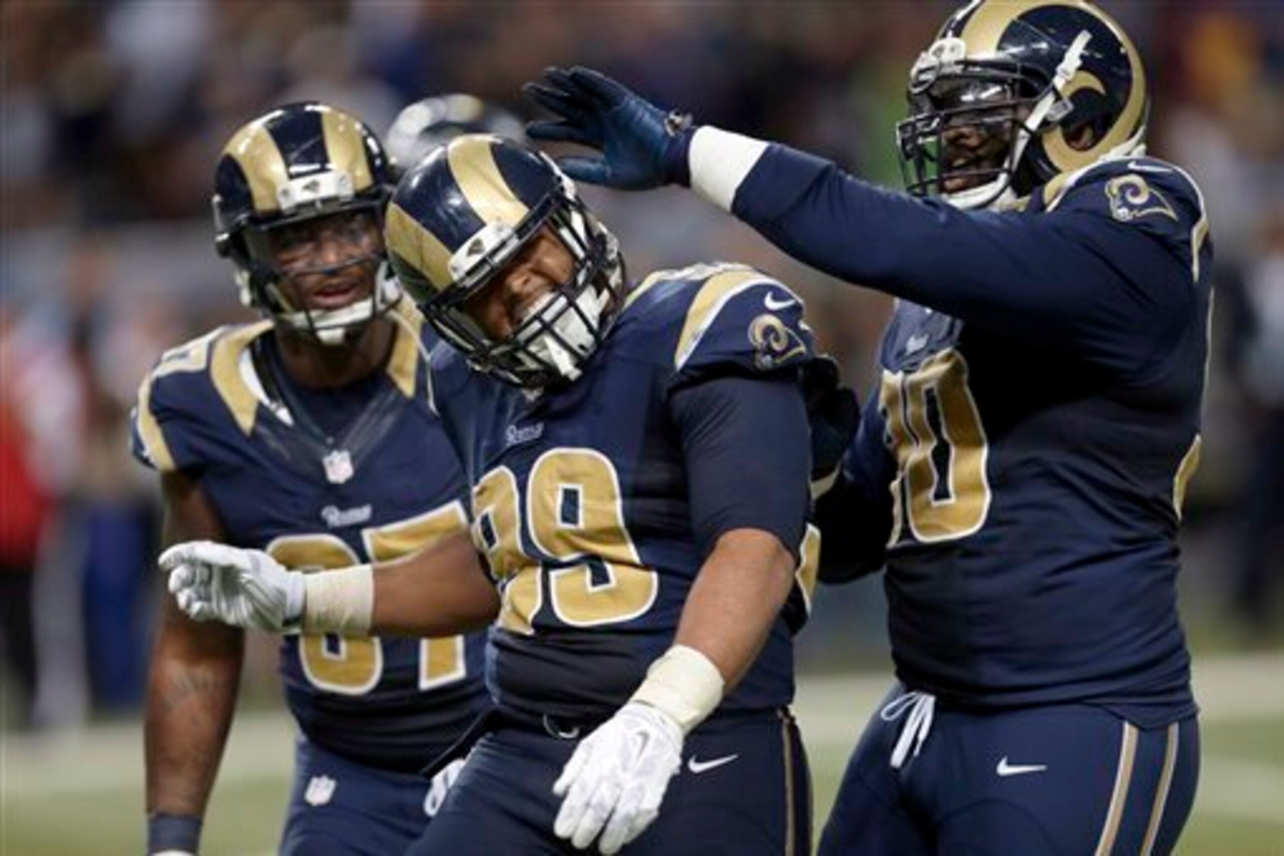 Defensive tackle Aaron Donald (No. 99) leads a relentless Rams defensive line.