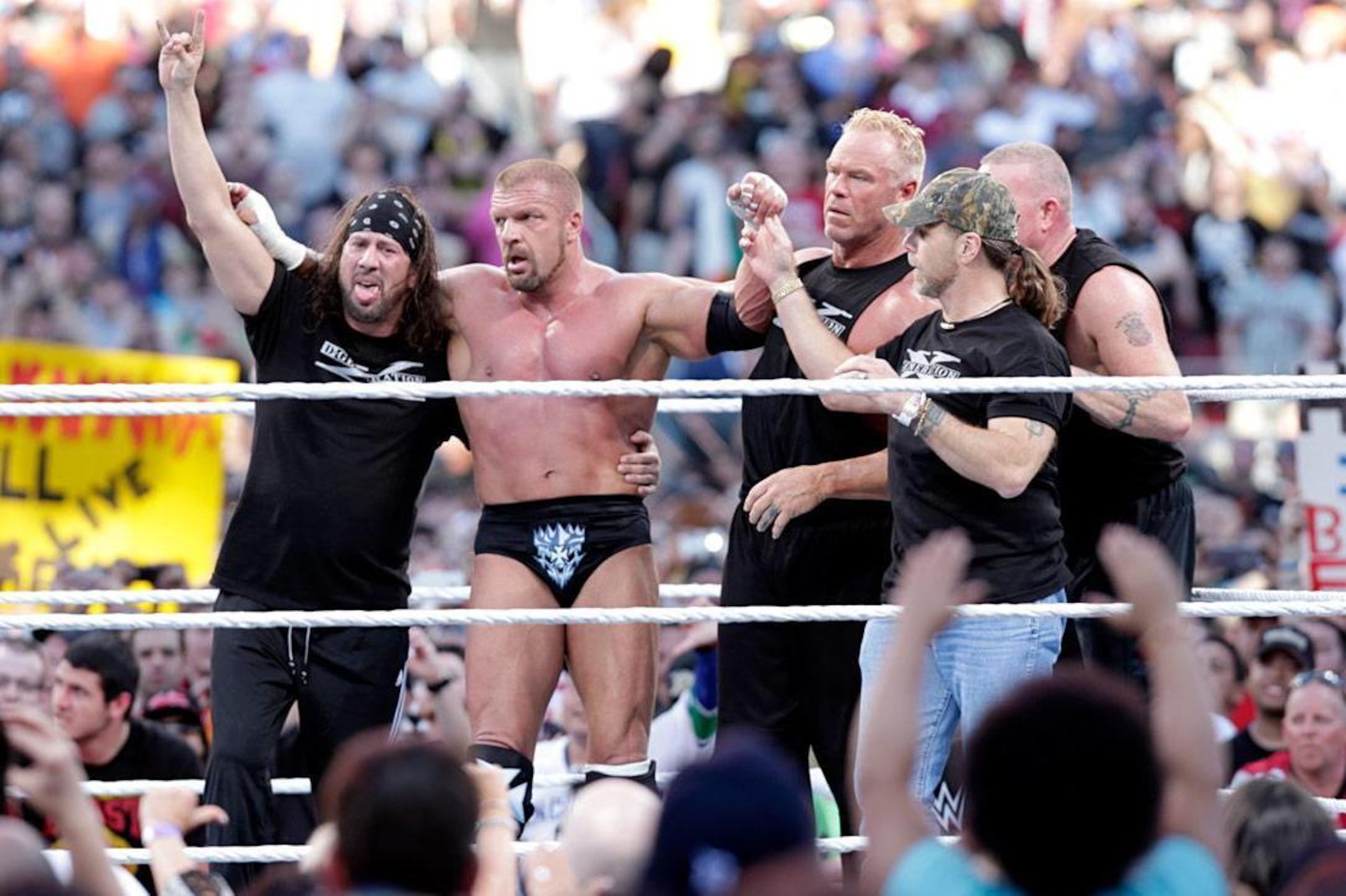 Triple H celebrates at Mania