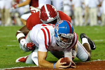 TUSCALOOSA, AL - SEPTEMBER 19:  Chad Kelly #10 of the Mississippi Rebels dives for a touchdown against Shaun Hamilton #20 of the Alabama Crimson Tide at Bryant-Denny Stadium on September 19, 2015 in Tuscaloosa, Alabama.  (Photo by Kevin C. Cox/Getty Image