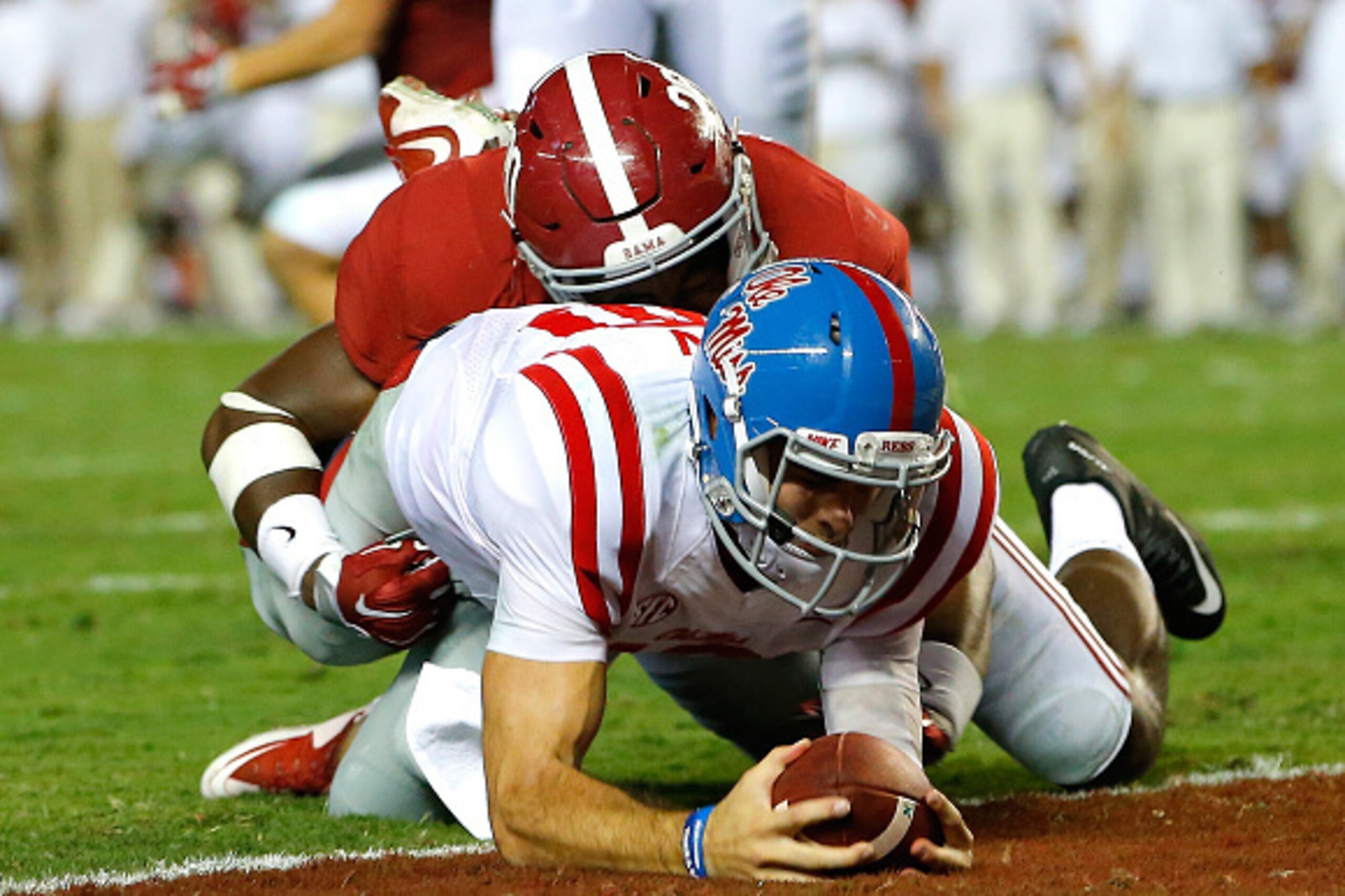 TUSCALOOSA, AL - SEPTEMBER 19:  Chad Kelly #10 of the Mississippi Rebels dives for a touchdown against Shaun Hamilton #20 of the Alabama Crimson Tide at Bryant-Denny Stadium on September 19, 2015 in Tuscaloosa, Alabama.  (Photo by Kevin C. Cox/Getty Image