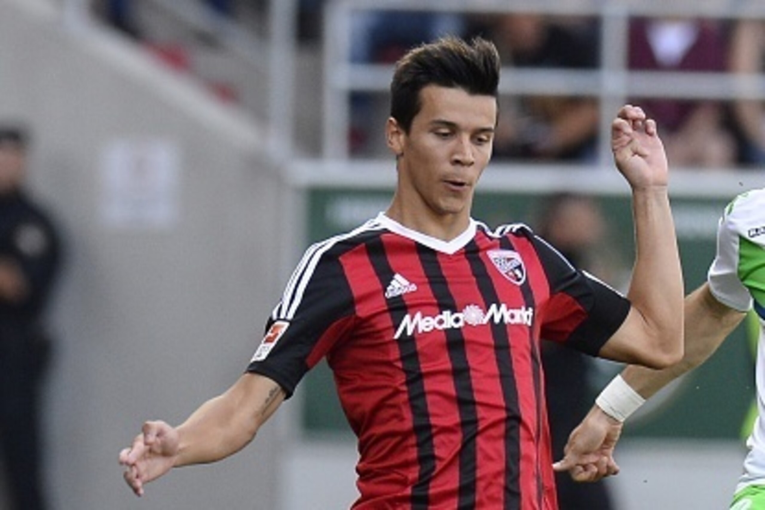 Ingolstadt's US midfielder Alfredo Morales controls the ball during the German first division Bundesliga football match FC Ingolstadt v VfL Wolfsburg, in Ingolstadt , on September 12, 2015.  AFP PHOTO /  THOMAS KIENZLE 

RESTRICTIONS: DURING MATCH TIME: D