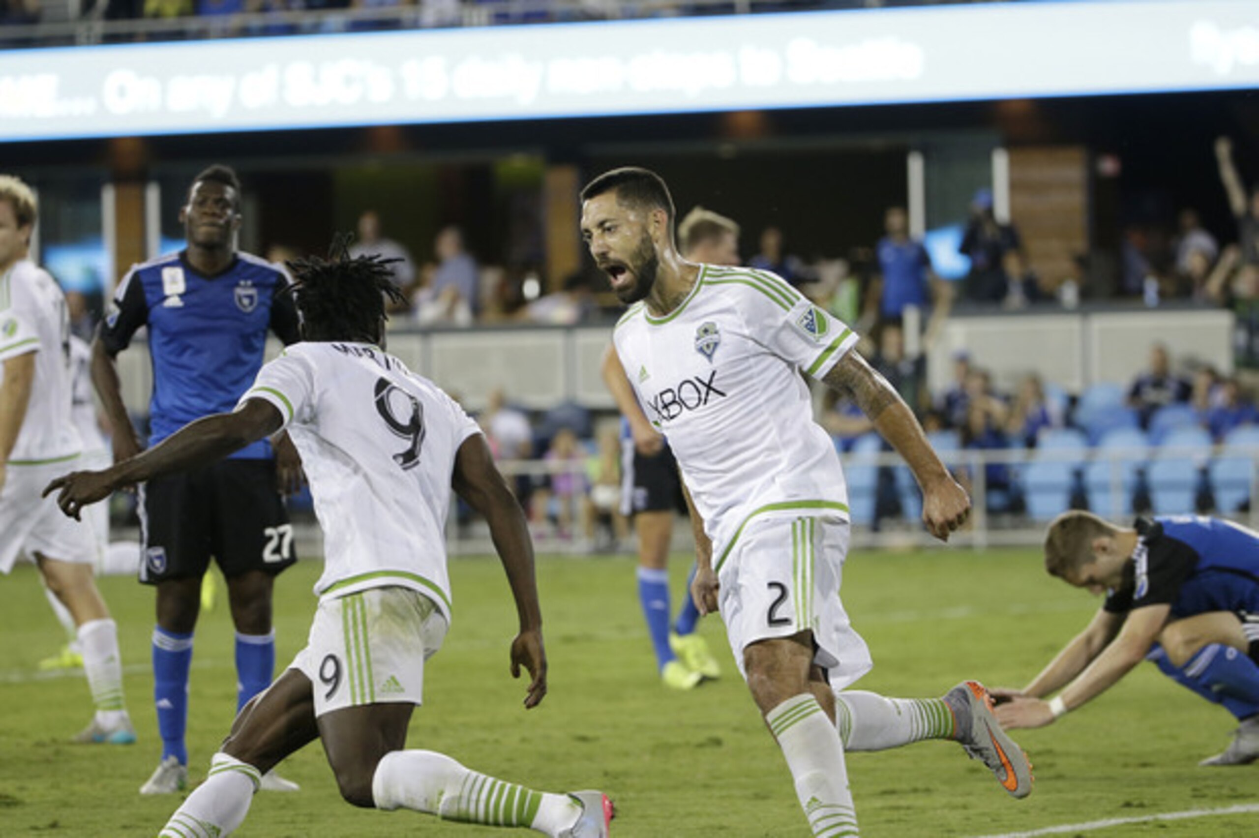 Dempsey (right) made two assists in Seattle's 3-0 win against Vancouver.