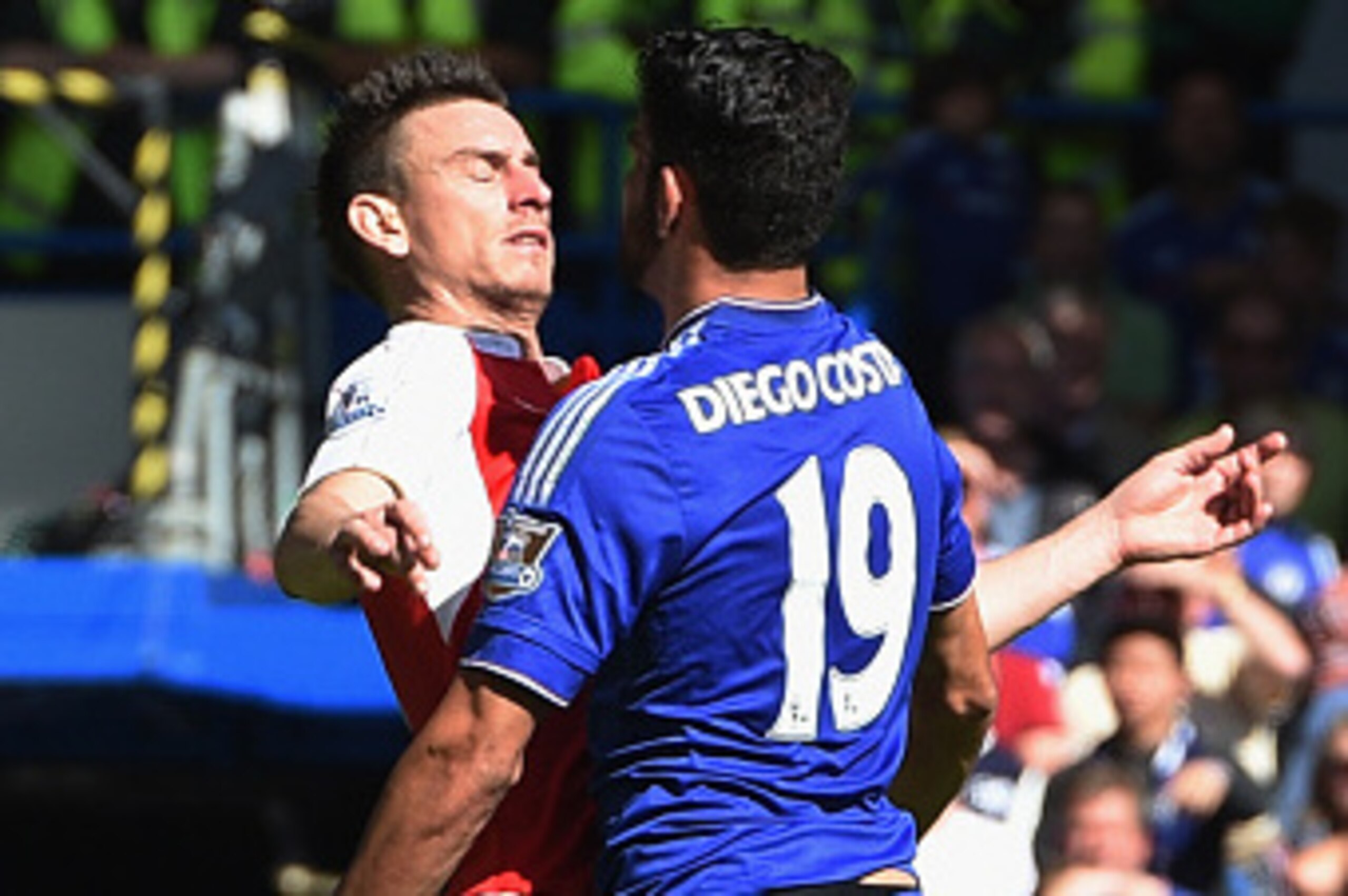 LONDON, ENGLAND - SEPTEMBER 19: Diego Costa of Chelsea and Laurent Koscielny of Arsenal clash during the Barclays Premier League match between Chelsea and Arsenal at Stamford Bridge on September 19, 2015 in London, United Kingdom.  (Photo by Ross Kinnaird