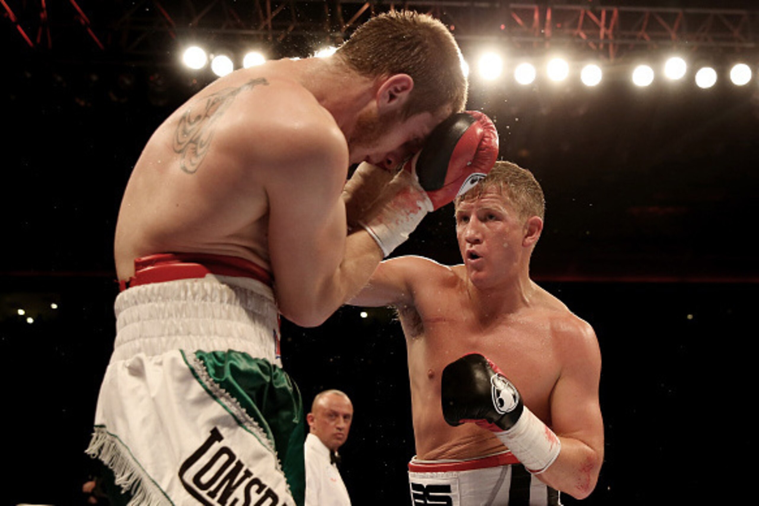 LIVERPOOL, ENGLAND - NOVEMBER 22:  Bradley Saunders in action with Ivans Levickis during their Light Welterweight bout at Liverpool Echo Arena on November 22, 2014 in Liverpool, England.  (Photo by Scott Heavey/Getty Images)