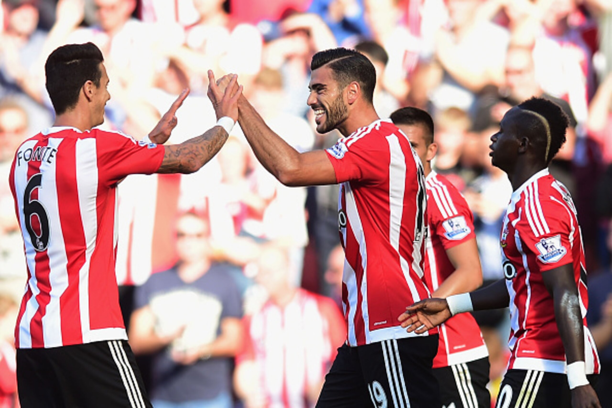 SOUTHAMPTON, ENGLAND - SEPTEMBER 20:  Graziano Pelle of Southampton (19) celebrates with team mates as he scores their first goal during the Barclays Premier League match between Southampton and Manchester United at St Mary's Stadium on September 20, 2015