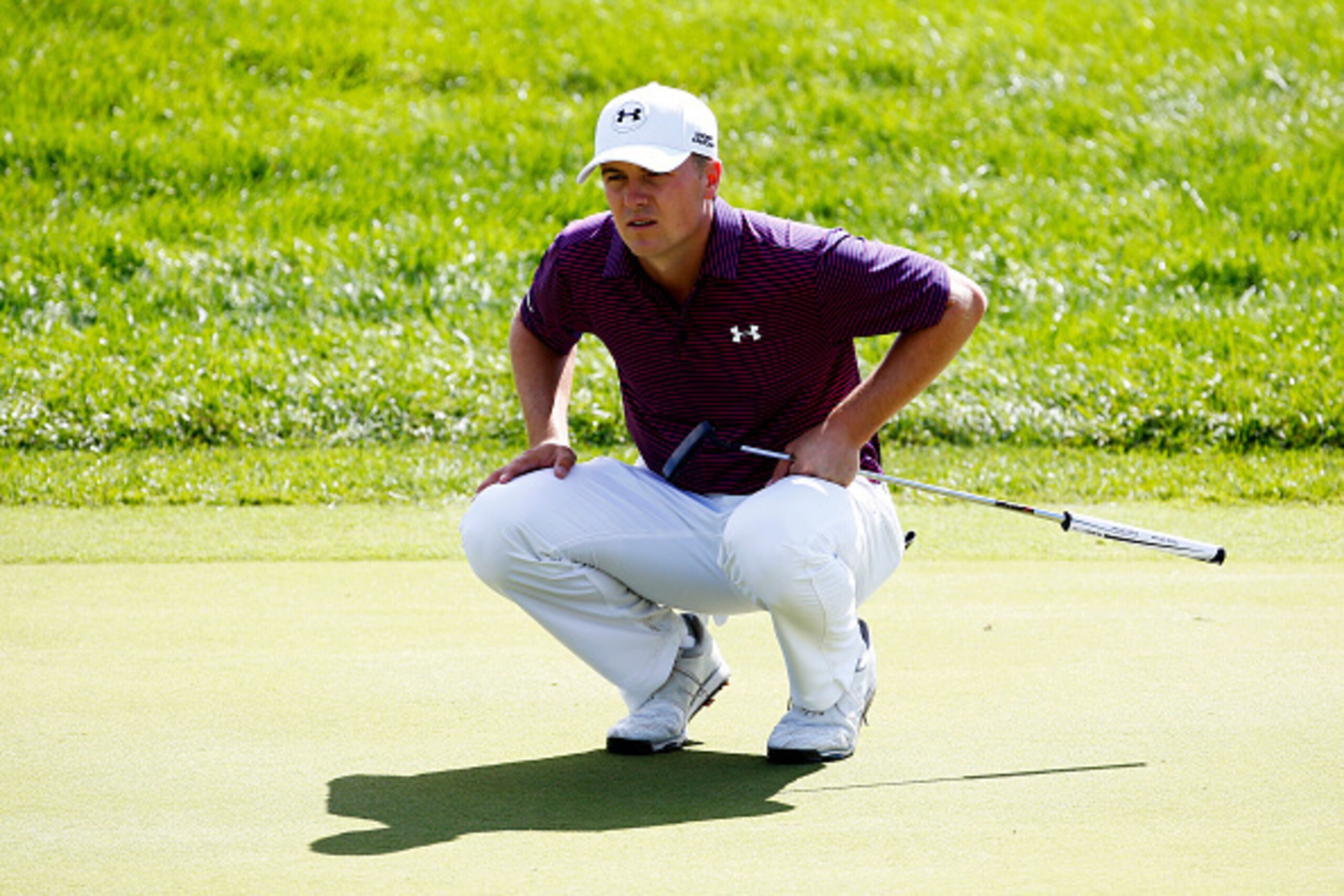 LAKE FOREST, IL - SEPTEMBER 20:  Jordan Spieth lines up a putt on the third green during the Final Round of the BMW Championship at Conway Farms Golf Club on September 20, 2015 in Lake Forest, Illinois.  (Photo by Jamie Squire/Getty Images)